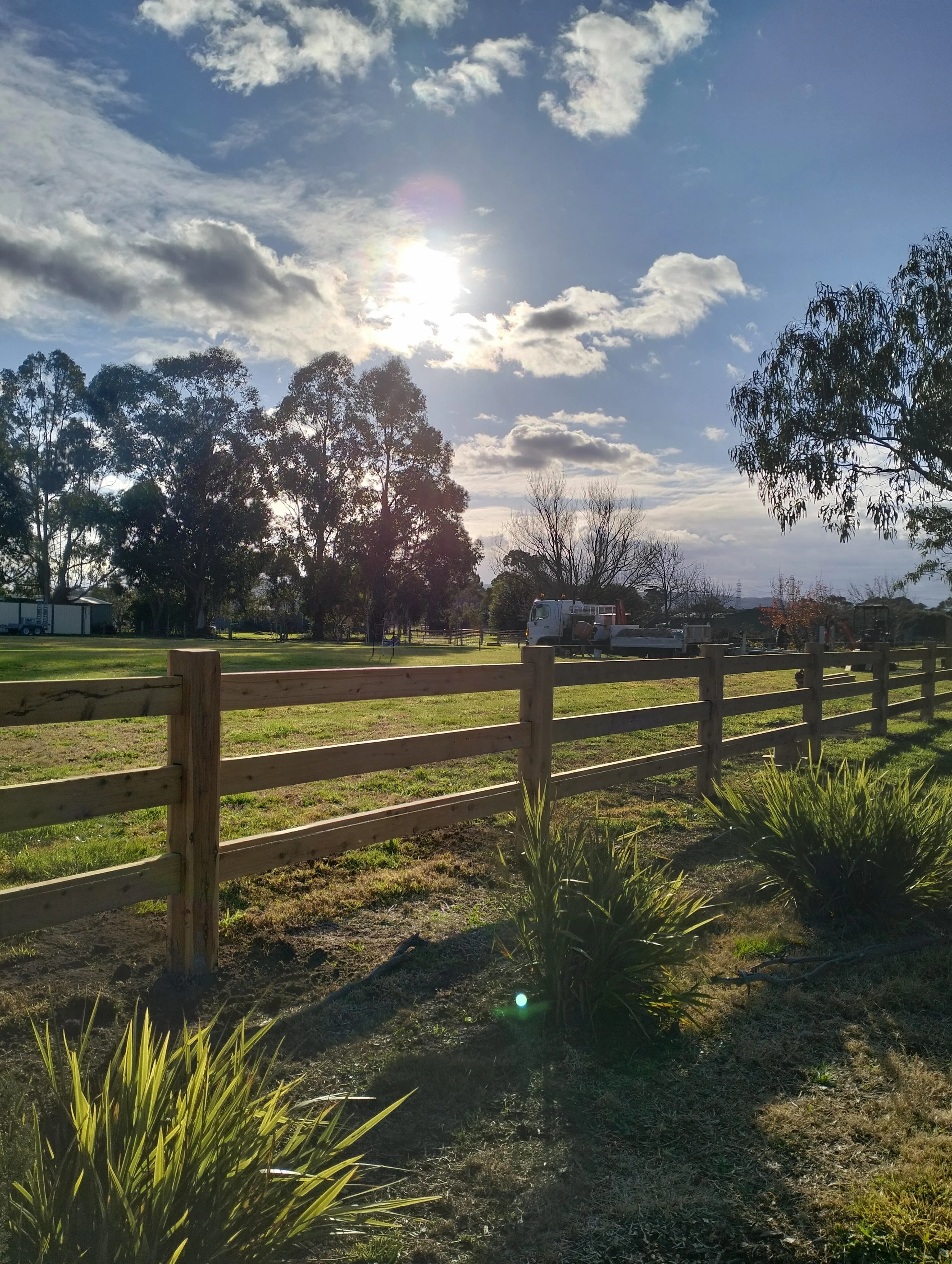 Installation of DIY Mortised Post and Rail Fence.jpg