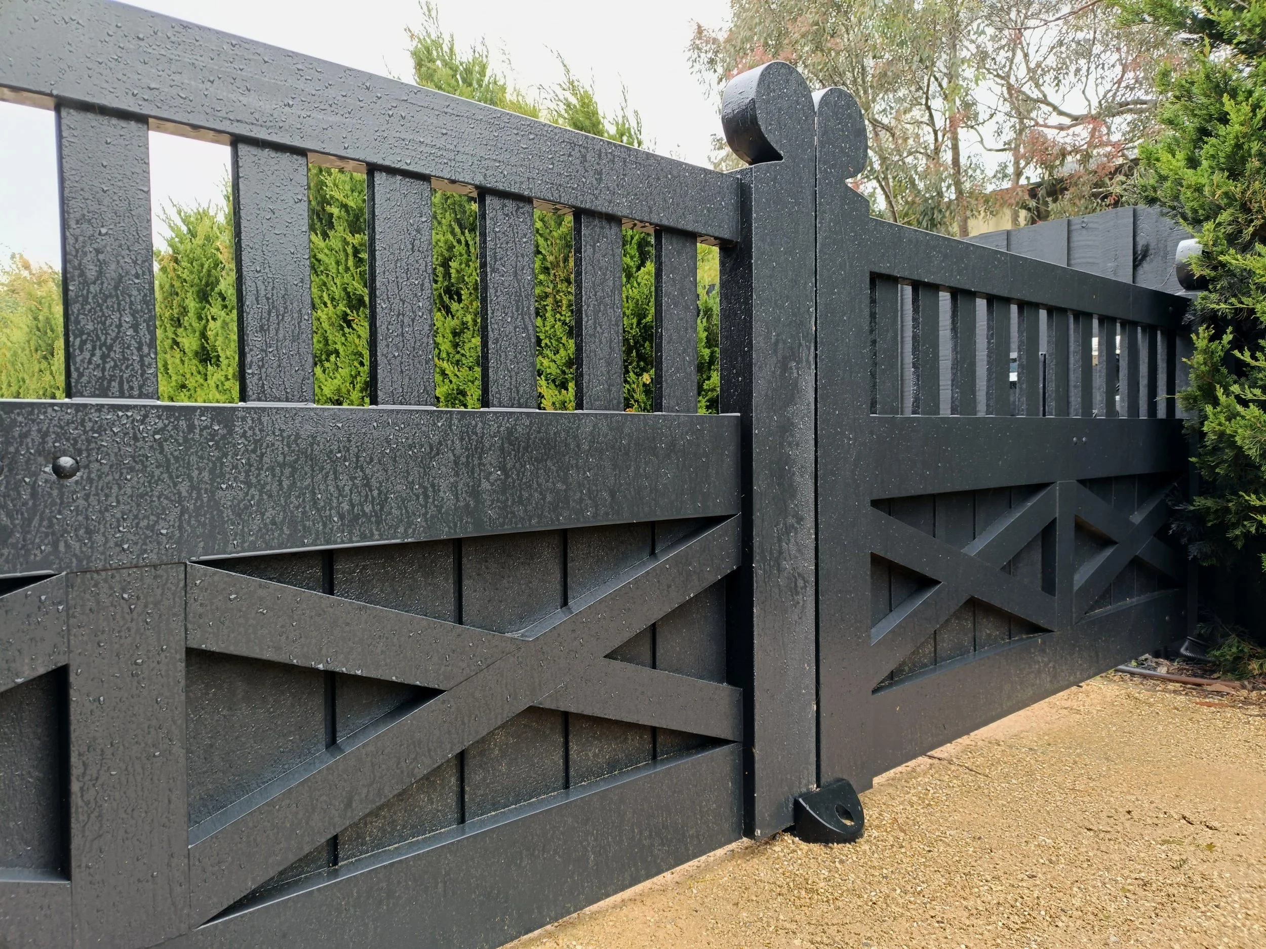 Painted Front Entrance Timber Gates Installed Automated.jpg
