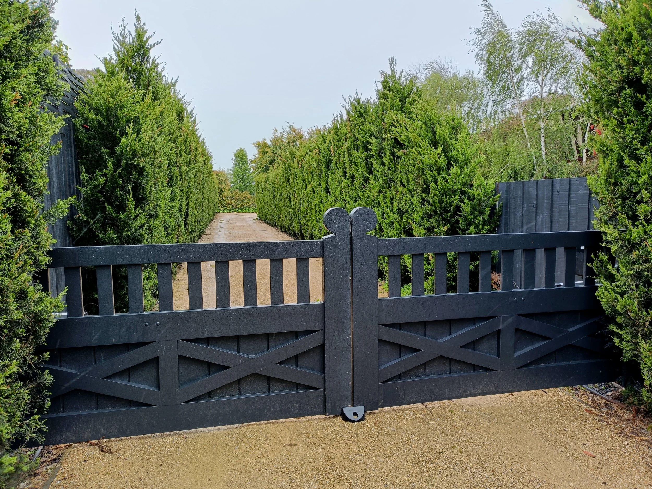 Painted Timber Gates Front Entrance Custom Designed.jpg