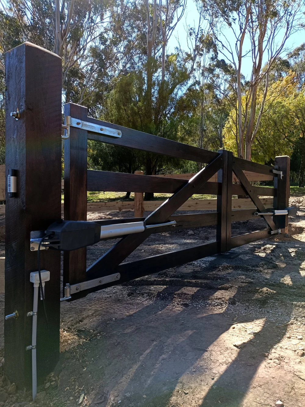 Gate automation fitted to a timber swing gate