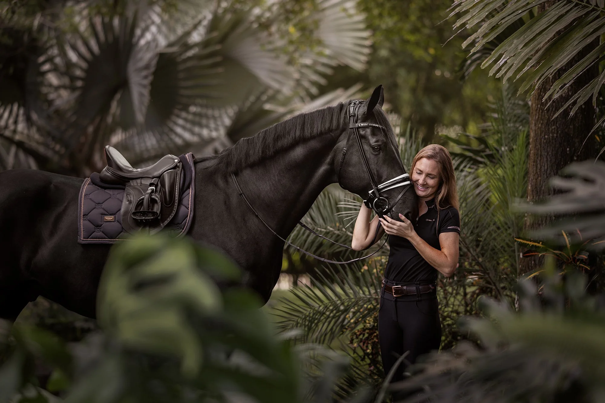 J.Klein Photos Wellington Florida Dressage Equine Photographer, offers Horse & Rider portraits, black background and action photos for Equestrians and businesses needing branding images. Marcus Fyffe Dressage with USA rider Claire Darnell.