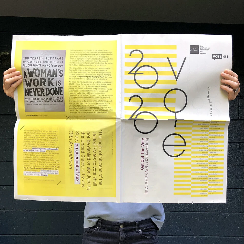 GOTV holding newspaper.jpg