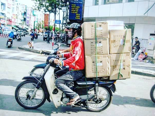 Sometimes I can't believe we lived in Vietnam for almost four years. Seeing people carry random stuff on motorbikes was normal. This haul is quite calm compared to others we've seen and it's in pretty good order. Check back for more photos of crazy t