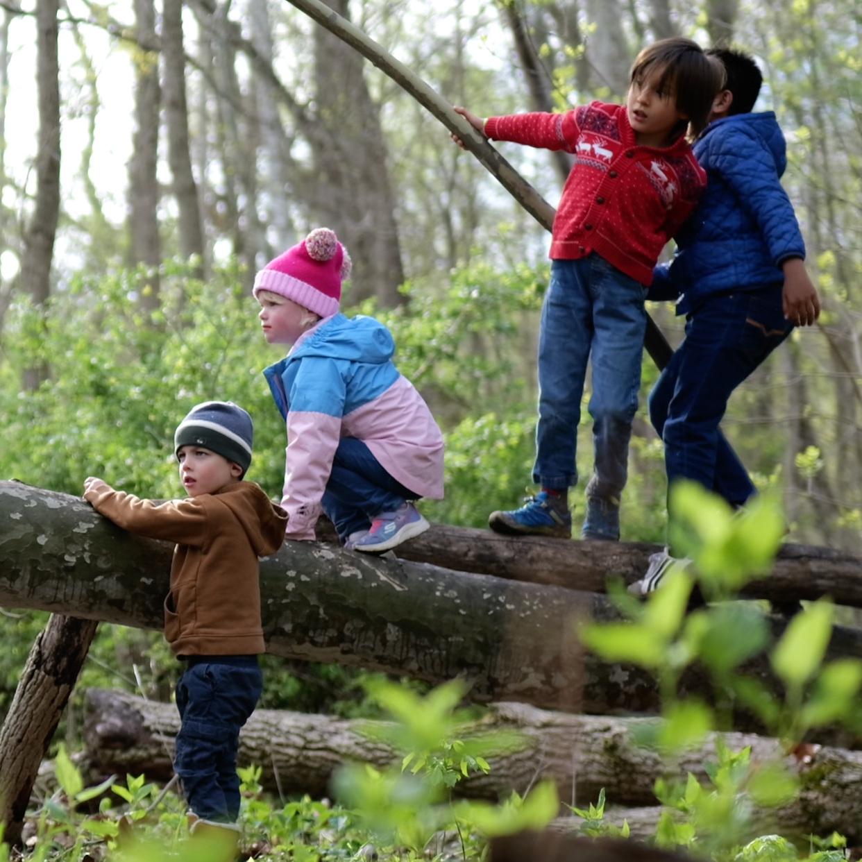 Children playing together at a Lafayette, Indiana community event hosted by Forest Academy