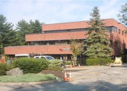 100 Foden Road East Brown Cow South Portland, ME Project management for acquisition of land to develop additional parking for the Class A Office Park in highly sensitive Long Creek watershed.