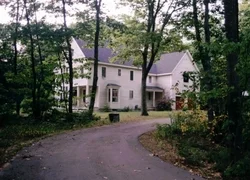 Private Residence Freeport, ME Custom built 3400 sq ft home with attached garage. Bonus rooms on third floor and over garage. Custom kitchen and bath cabints. Handmade custom-designed cabinetry in living room. Designed by Larry Fletcher Architect. Built by Sewall Associates (Greg Shinberg, lead).