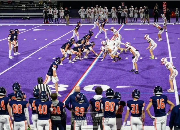 Mustangs Light the Night with a 21-0 Victory