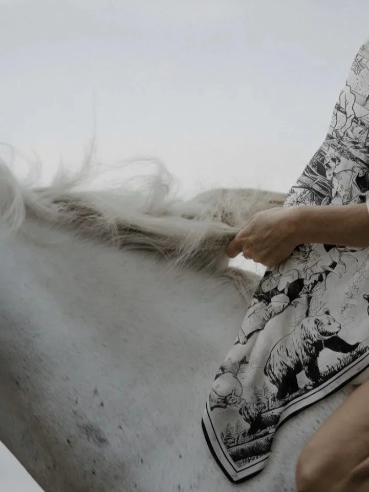 DEEP FOREST designer wool silk shawl — hands holding the soft wool silk fabric