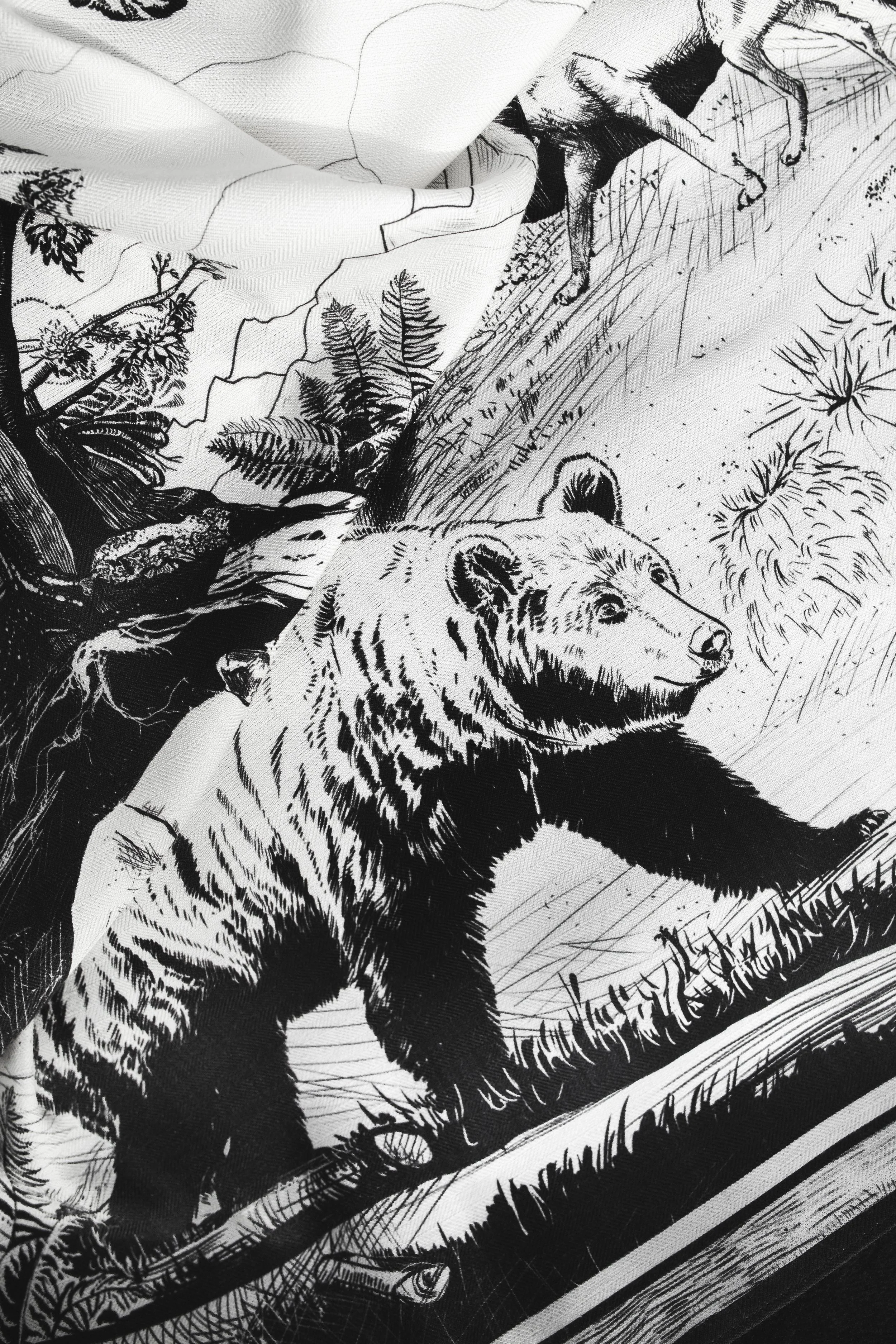 DEEP FOREST in black and white wool silk shawl — close-up of the bear in the forest print
