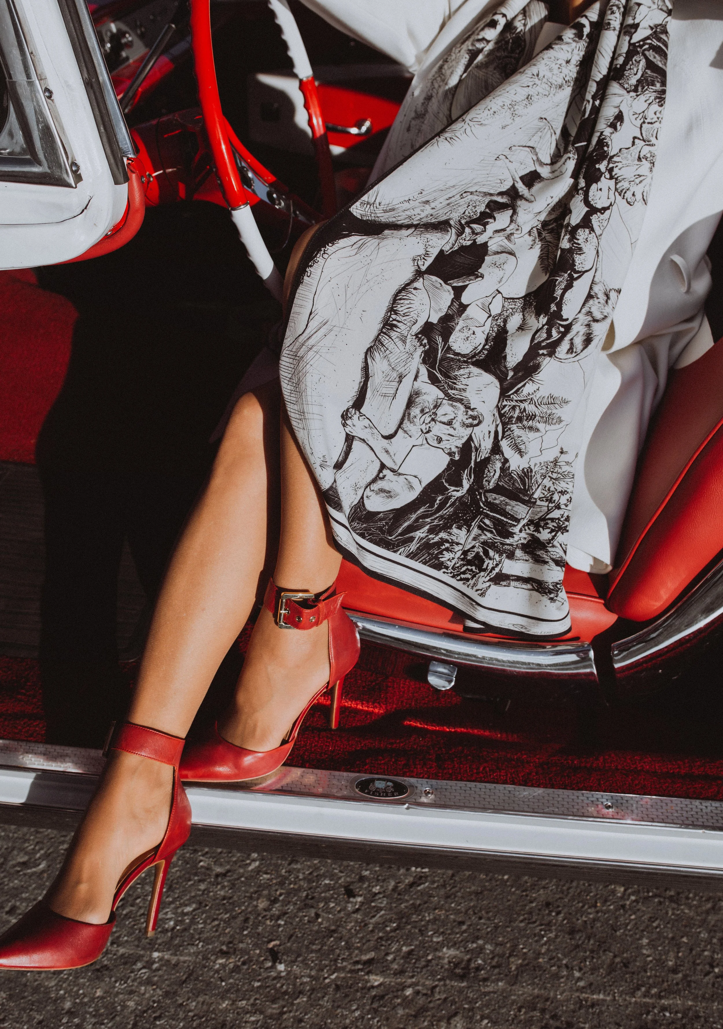 DEEP FOREST in black and white wool silk shawl — styled in a vintage red car