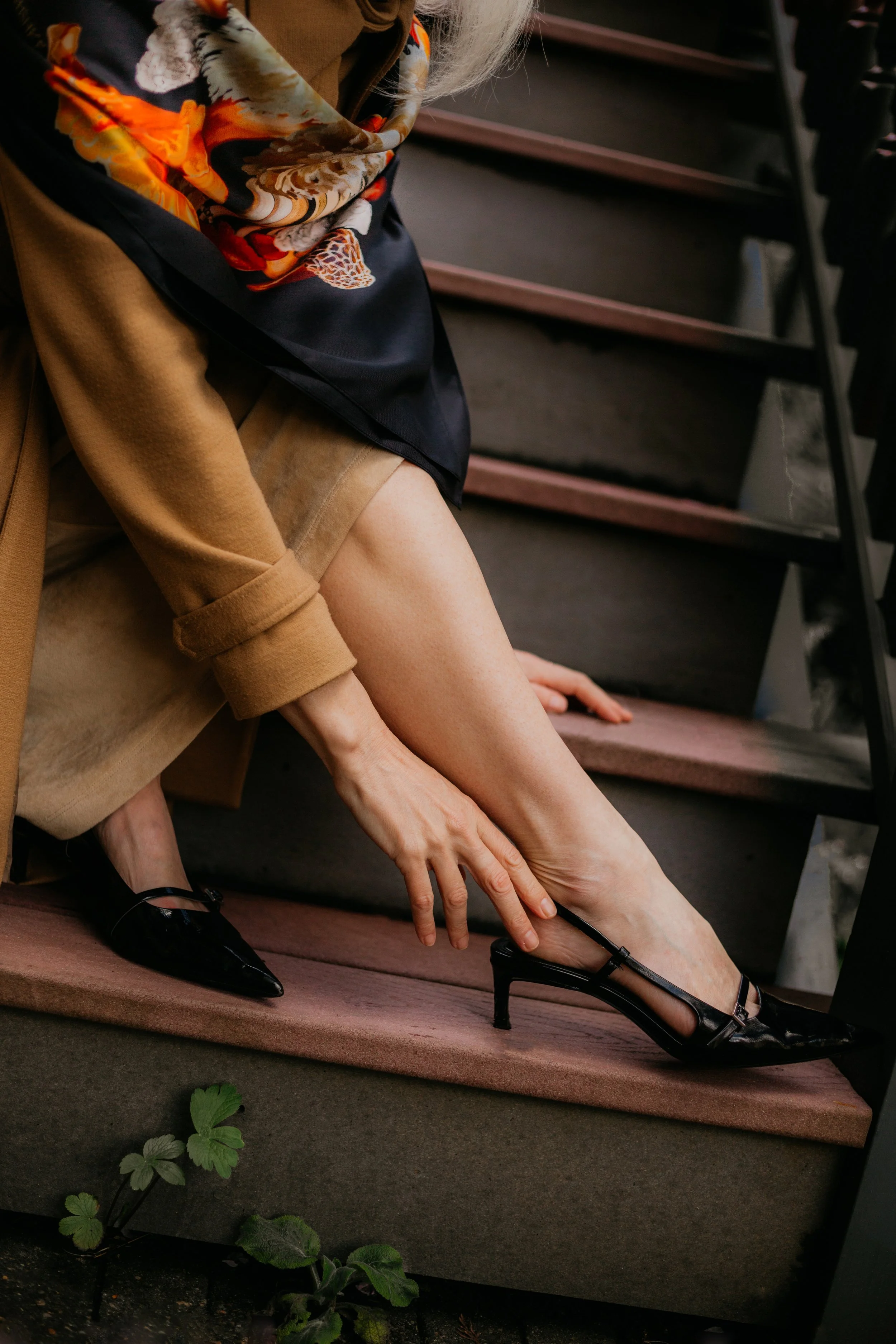 UNITY - in Black - silk scarf — close-up of the scarf draped over the legs