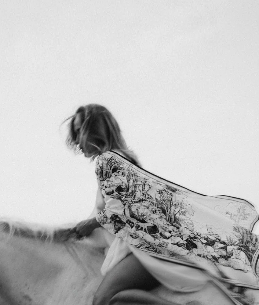 DEEP FOREST in black and white wool silk shawl — worn from behind, back view