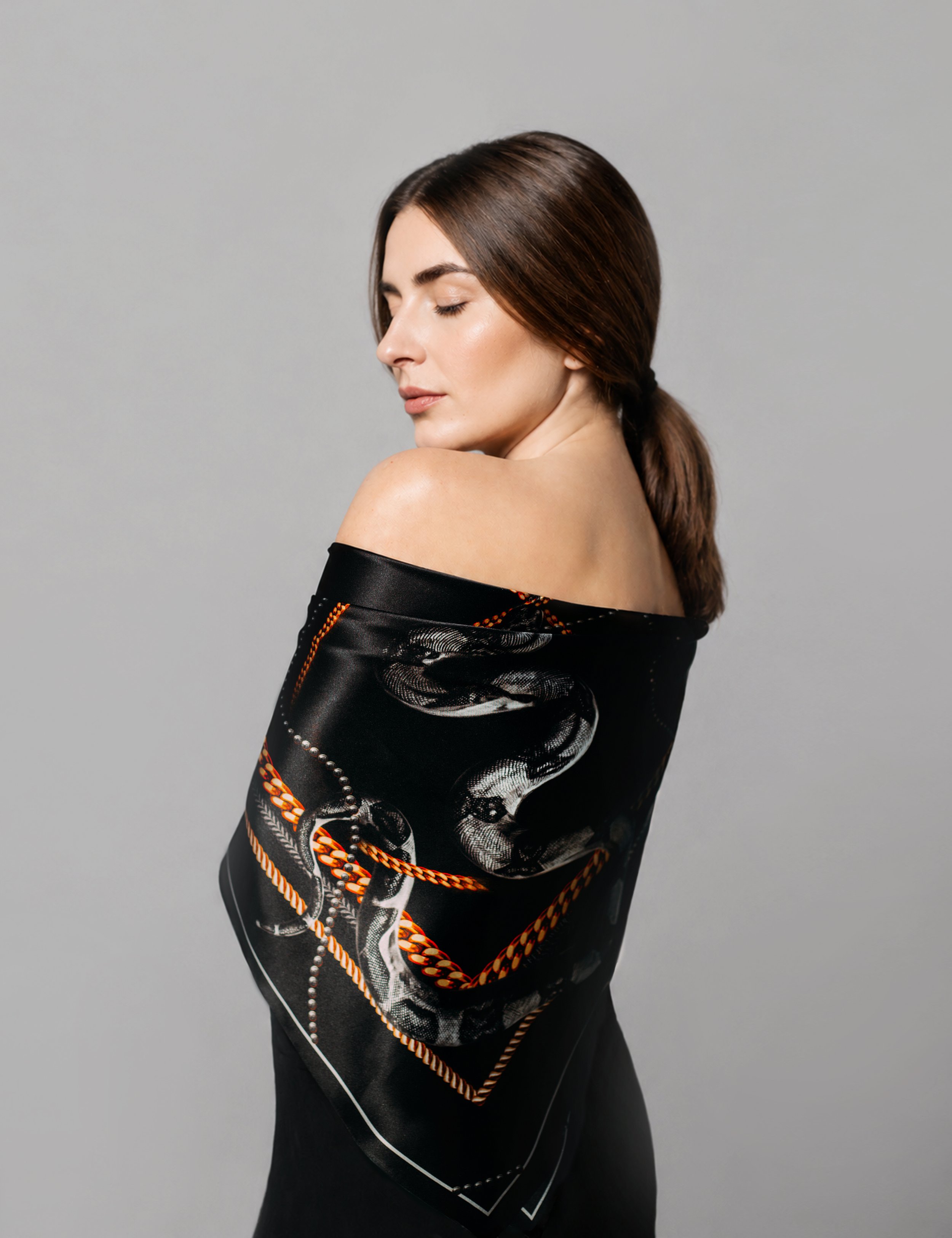Designer silk scarf black satin with snake pattern.jpg