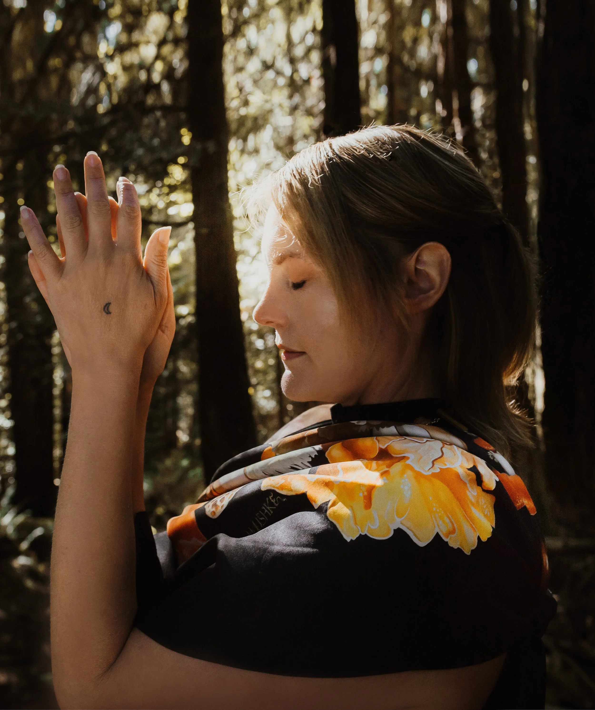 UNITY - in Black - silk scarf — worn in a forest, backlit portrait