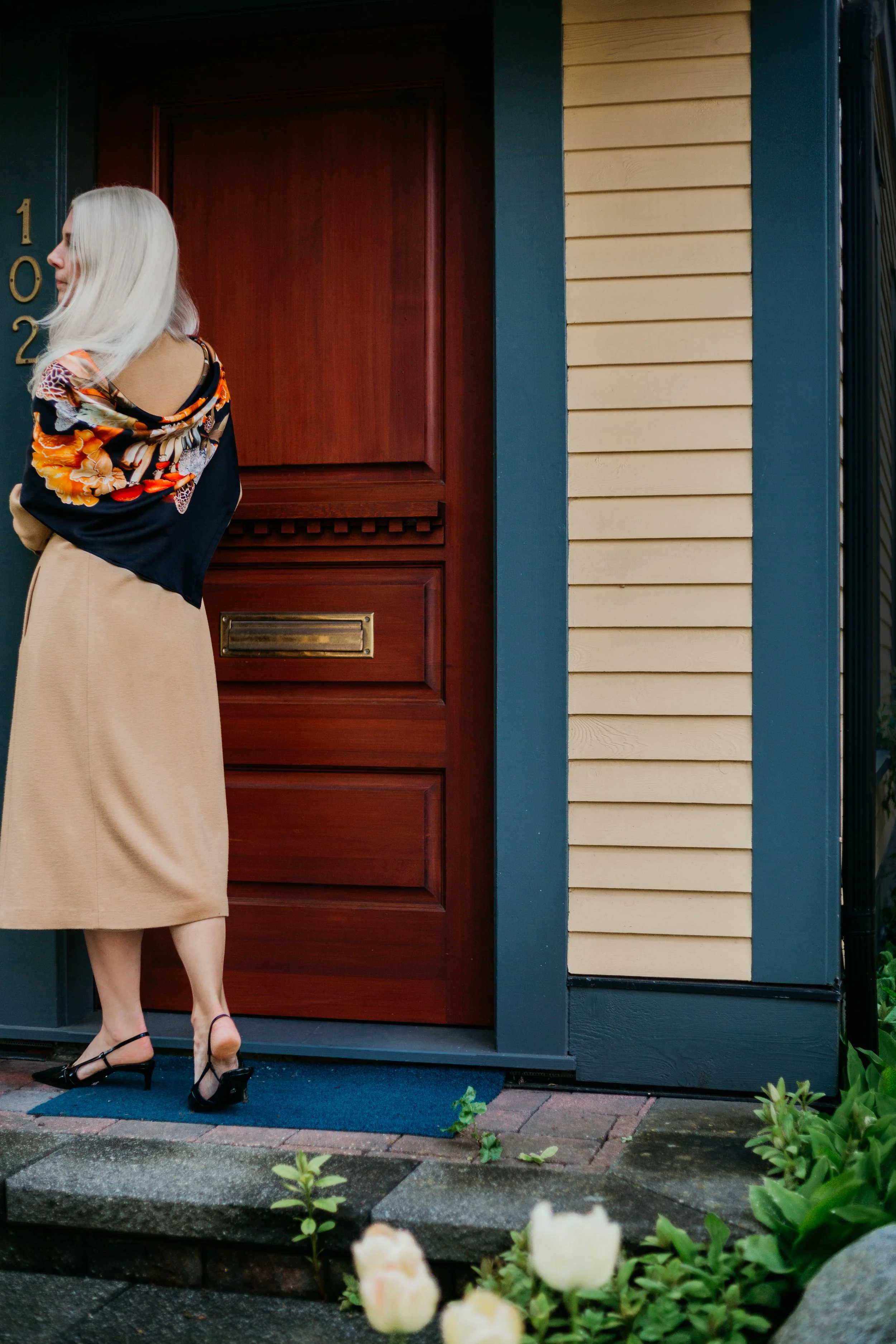 UNITY - in Black - silk scarf — worn over the shoulders with a beige coat