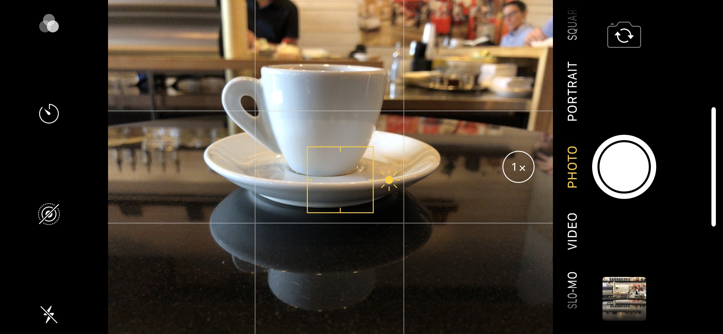  Tap to focus reveals an exposure compensation control at right. 