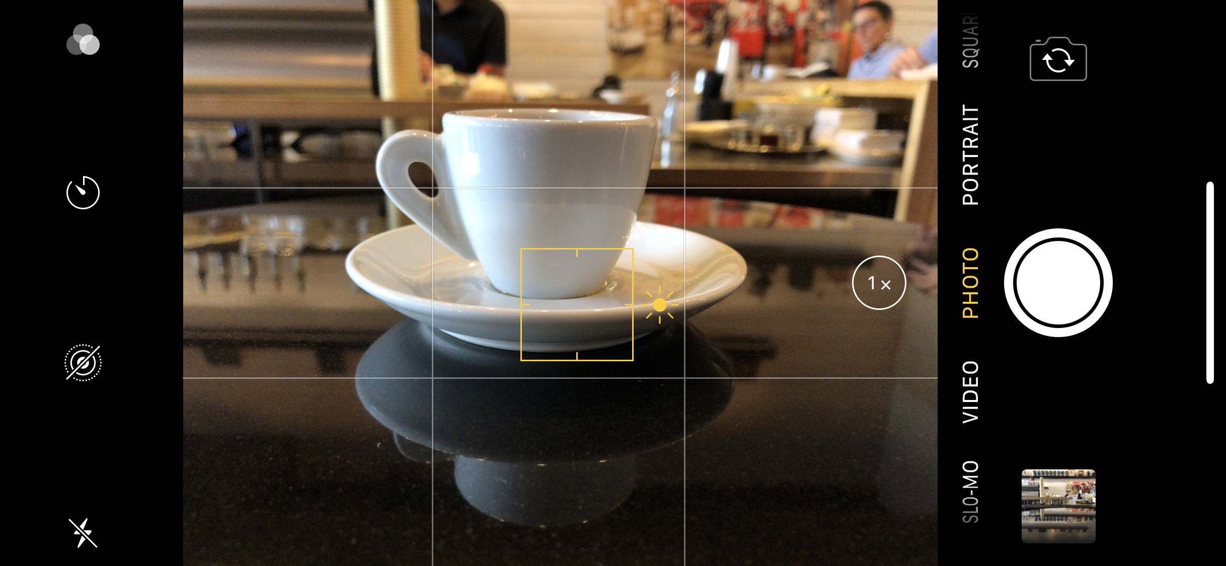 Tap to focus reveals an exposure compensation control at right.