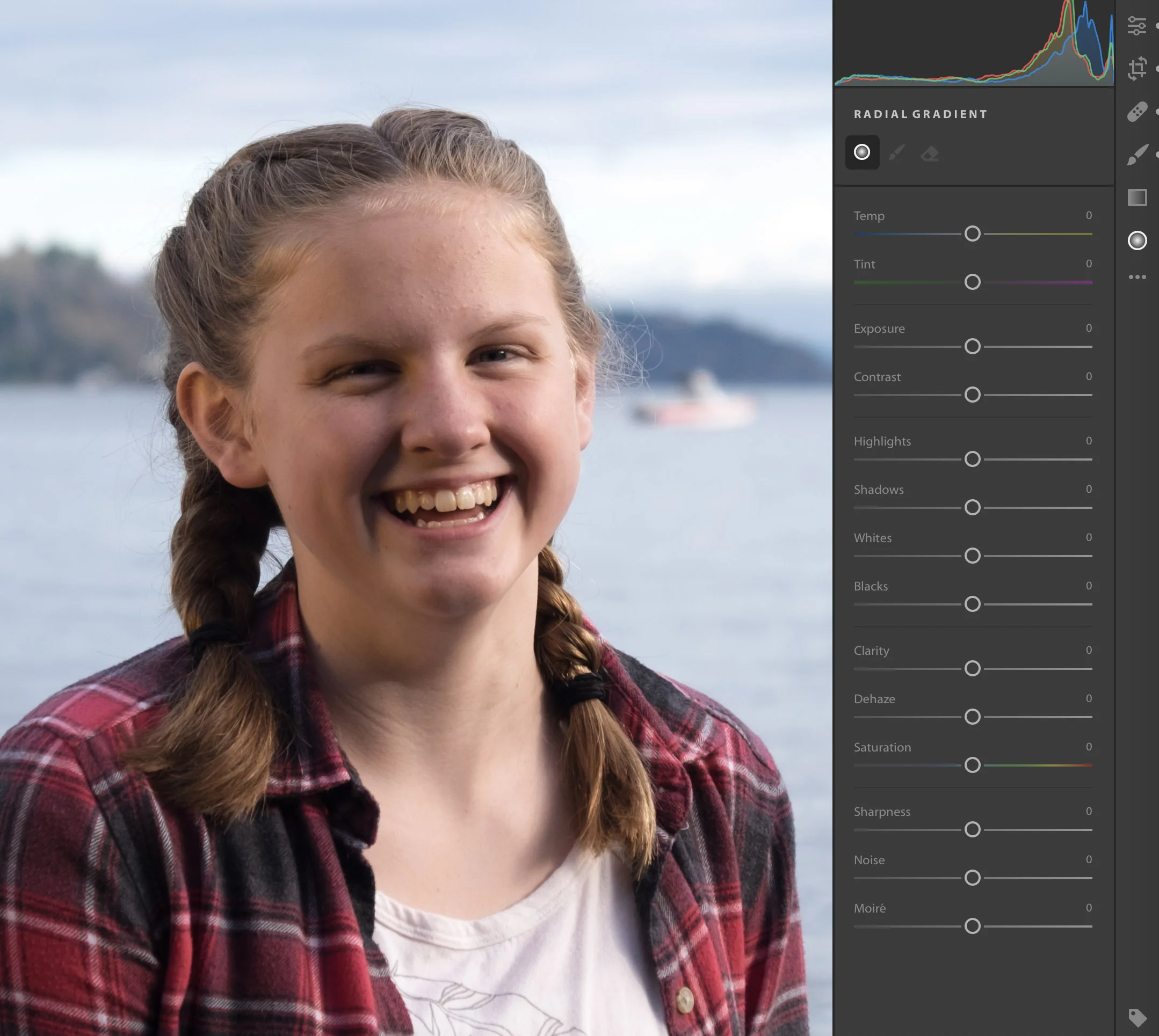 The left side of the girl's face is in more shadow than I'd prefer, so it's time to apply a Radial Gradient.