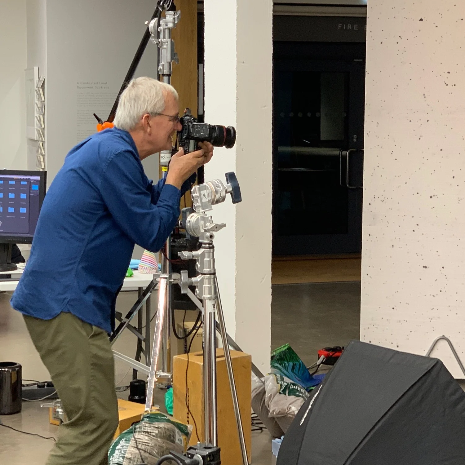 Martin Parr directs a portrait session Camera: iPhone XS Max Shutter speed: 1/50 sec Aperture: f/2.4 ISO: 80 Photo: Kirk McElhearn