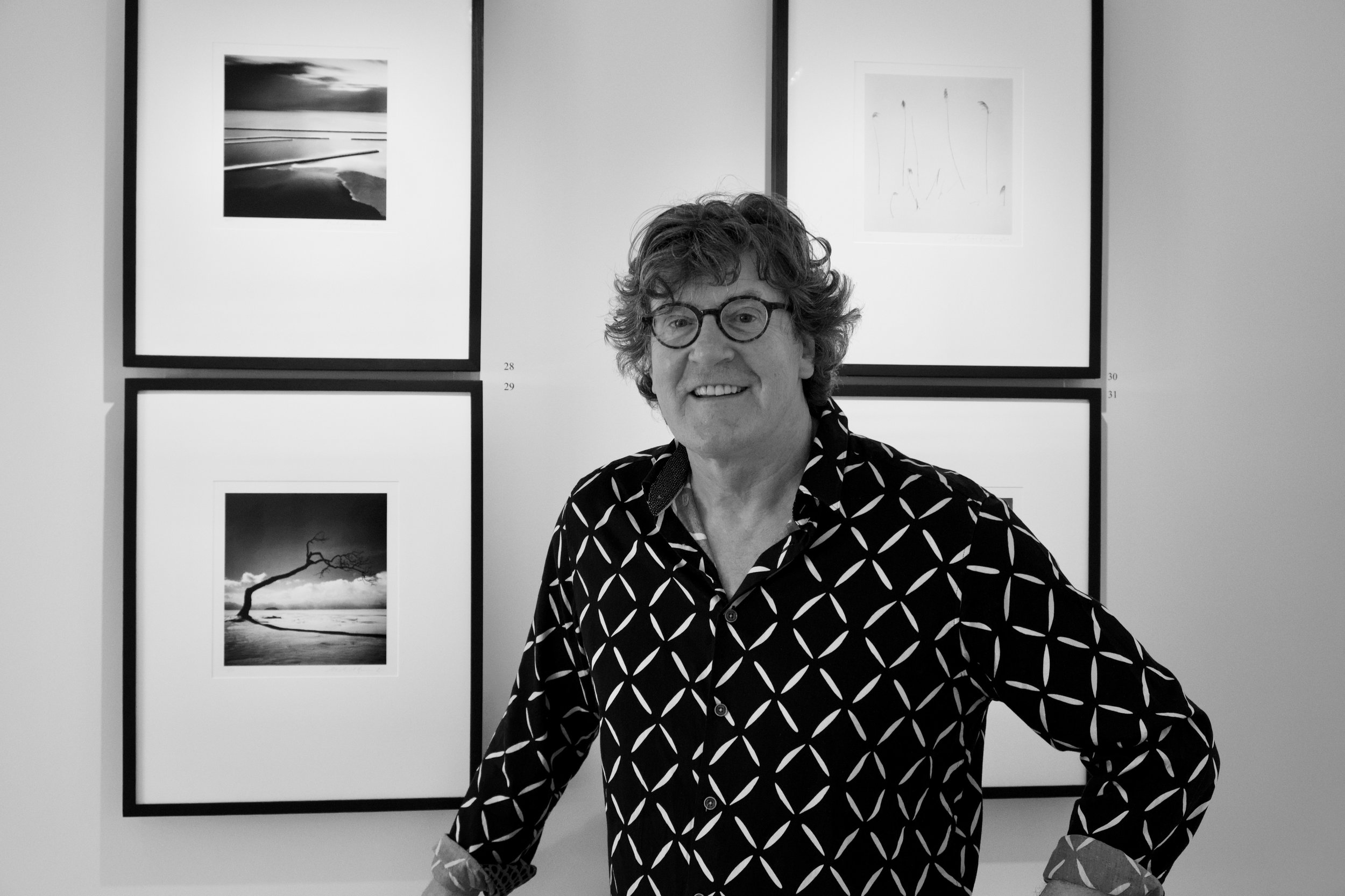 Michael Kenna with the print that Kirk purchased at lower-left. Camera: Fujifilm X-T3 Shutter speed: 1/160 sec Aperture: f/5.6 ISO: 1250 Photo: Kirk McElhearn