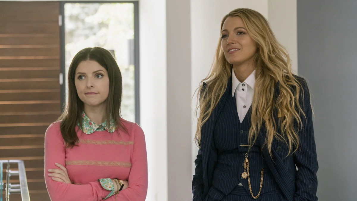 a-simple-favor-anna-kendrick-pink-sweater-blake-lively-suit.jpg