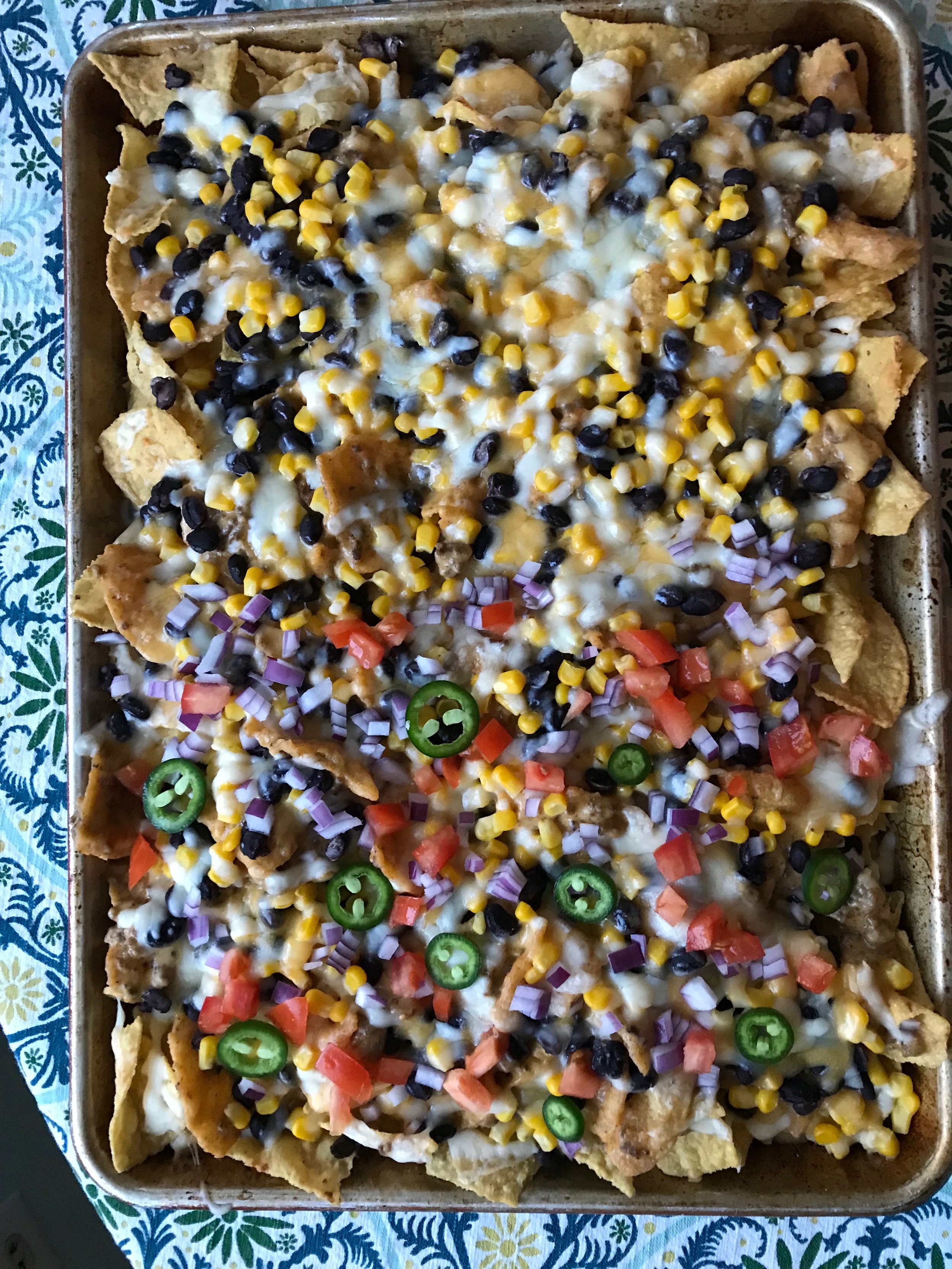 Tips on how to turn nachos into a family dinner that the kids will love (duh) and can actually deliver some health too | Didn't I Just Feed You , a podcast about feeding families