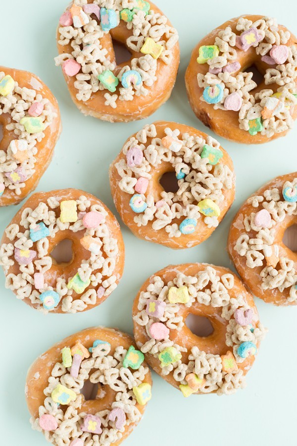 Lucky Charms Donuts: an easy treat you can make with store-bought donuts for St. Patrick's Day at Studio DIY | featured at Didn't I Just Feed You, a food podcast for parents