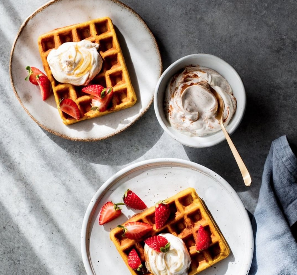 Top your waffles with yogurt! We love these Pumpkin Waffles from Half The Sugar, All The Love by Jennifer Tyler Lee