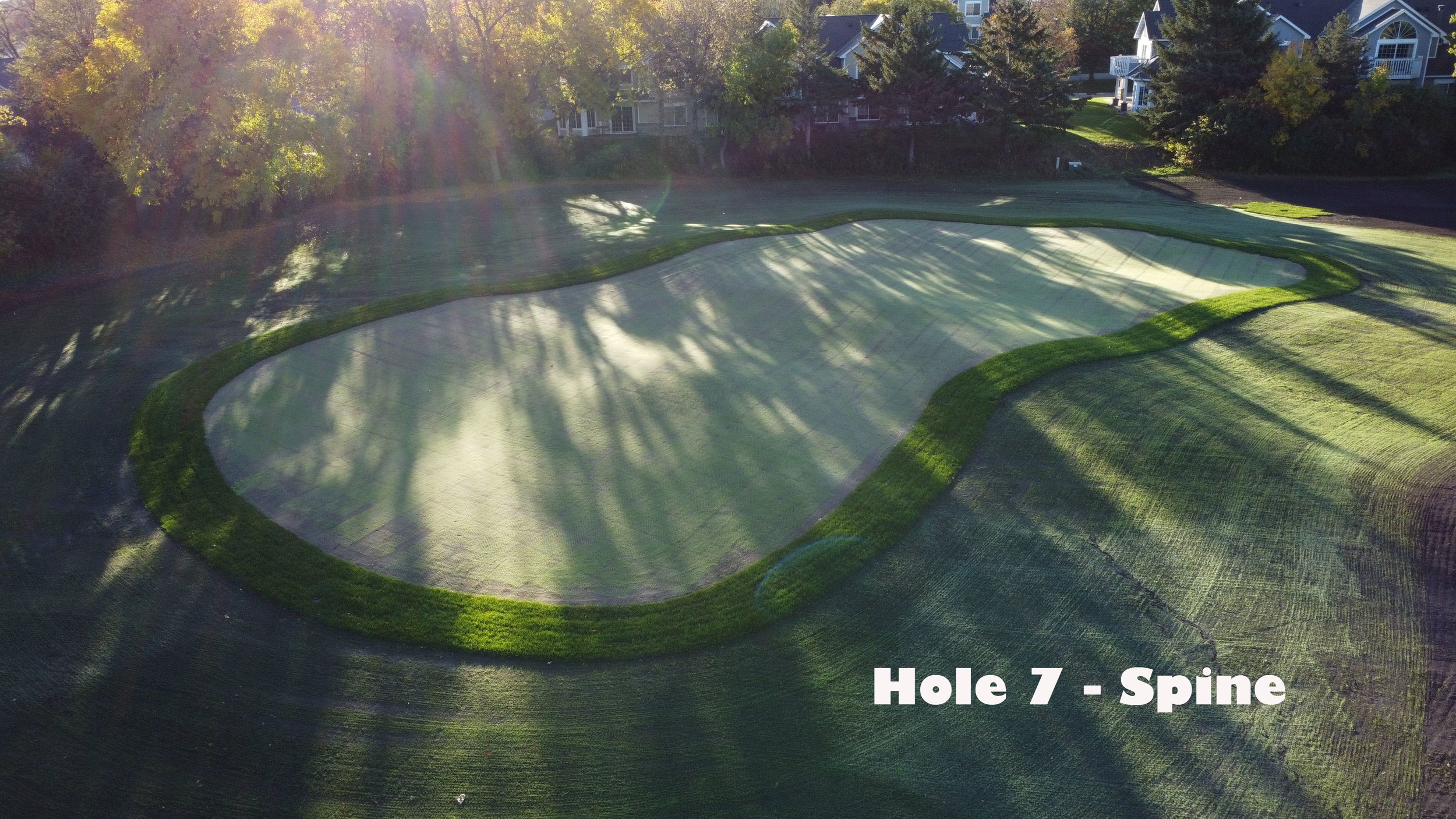  #7 Spine - 68 | 62 Green Shaped by Brett Hochstein  Our crumpled 7th green is built around a spine feature which extends towards the tee. The top of the spine can be pinned, but the majority of play will take place on the ‘wings’ of the putting surf