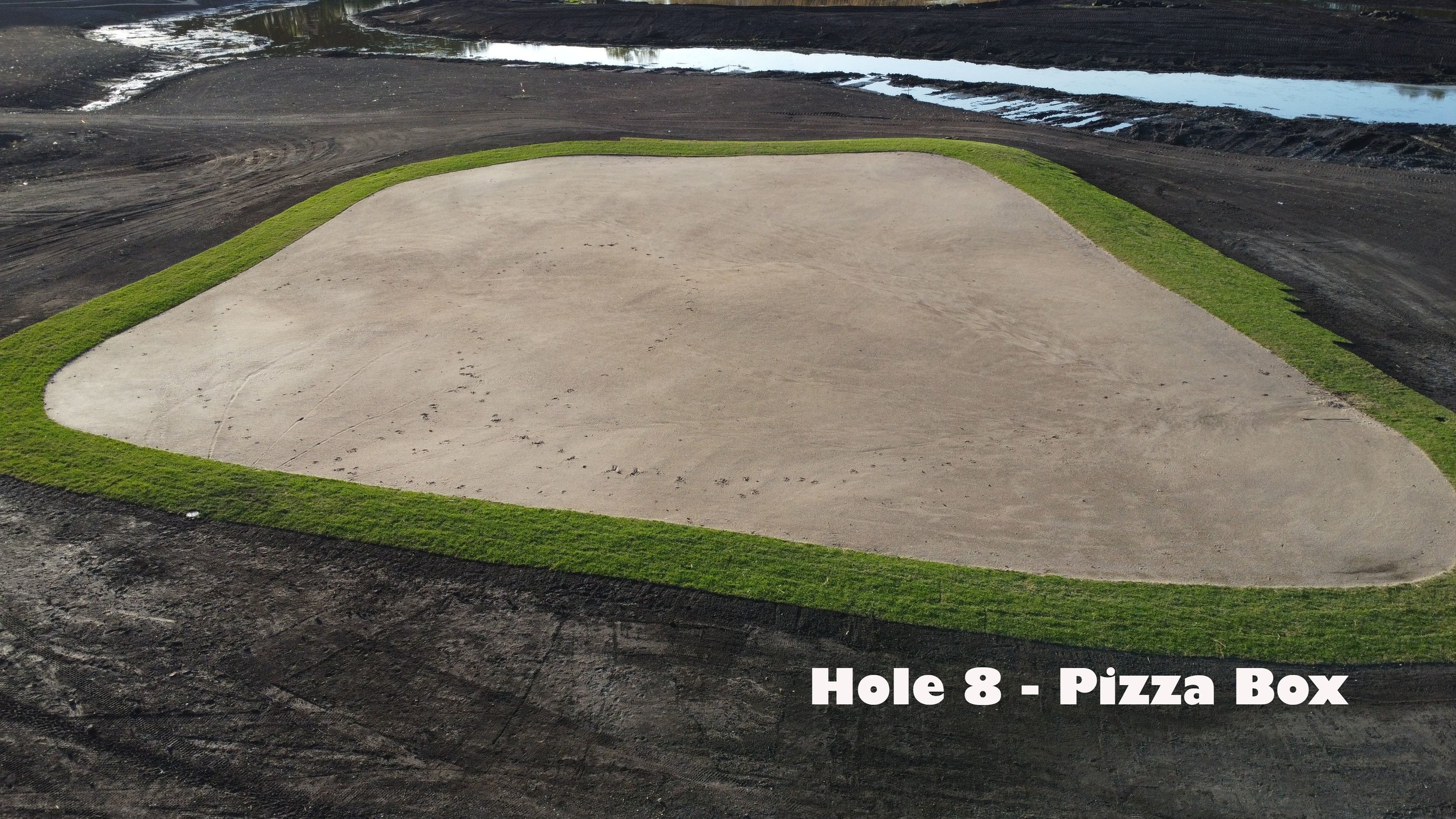  #8 Pizza Box - 136 | 107 Yards Green Shaped by Dan Bieganek  The famous Pizza Box!  Our eighth green is a tip-of-the-hat to 1920s golf architecture. In the art deco era squared-off greens were all the rage.   Viewed from above the 8th is a slightly 