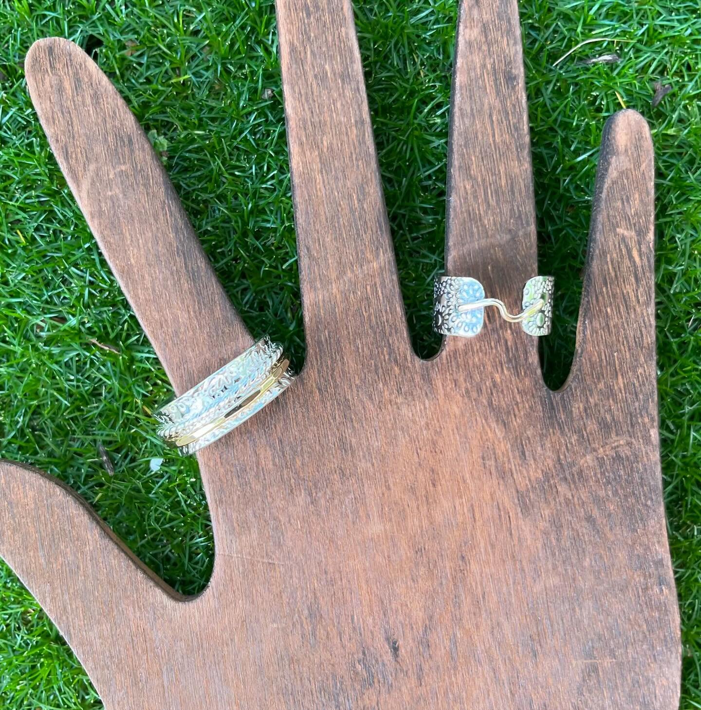 Finished up a couple of custom ring orders from my last show. They turned out beautifully 🥰 One spinner ring and a ring with a gold connection. 

#mnjewelrybyjessica 
#handmadejewelry 
#sterlingsilverjewelry 
#customorders