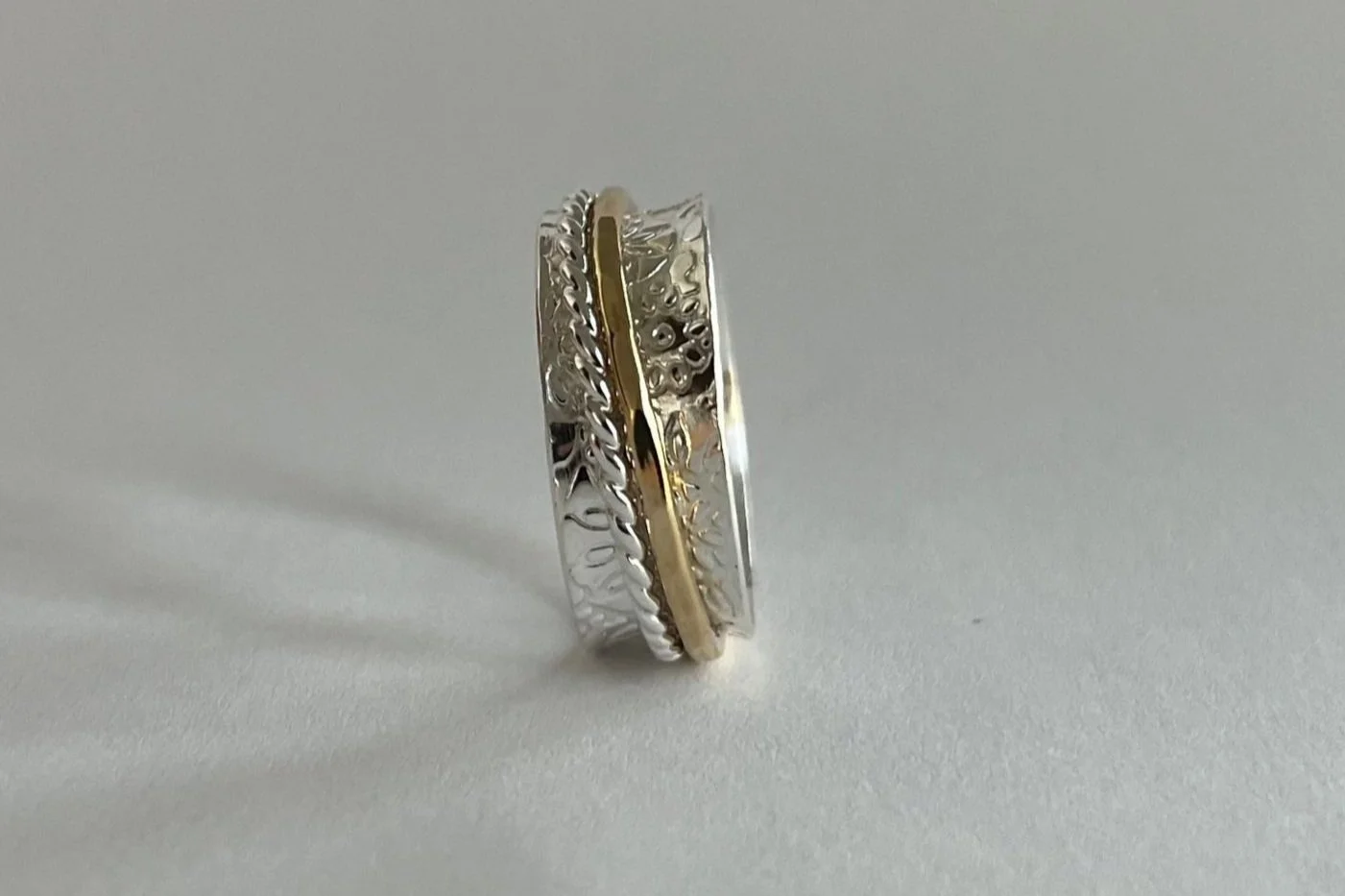 3/8" wide brass & sterling beaded spinner ring