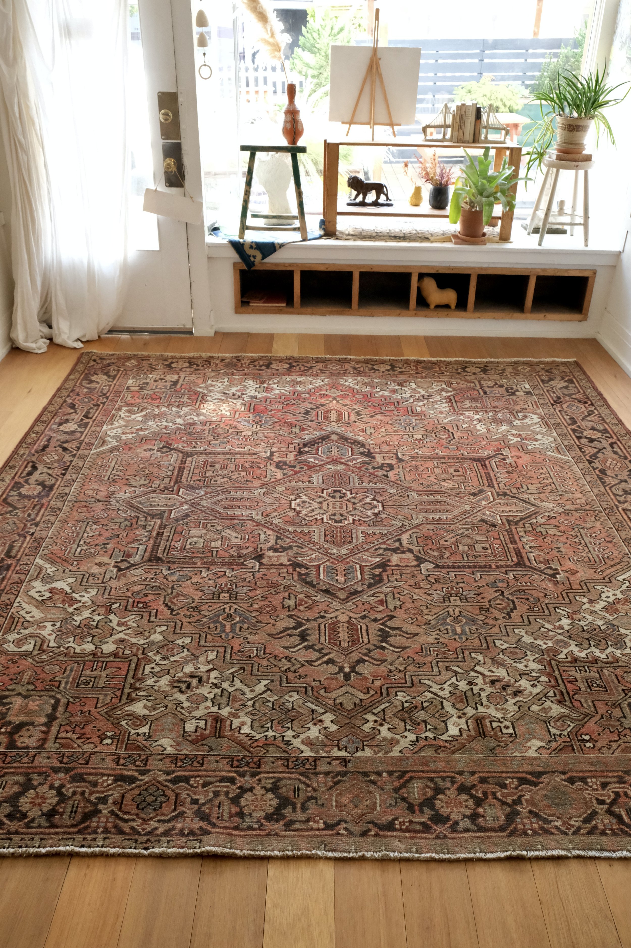 full photo of vintage Heriz rug displayed widthwise