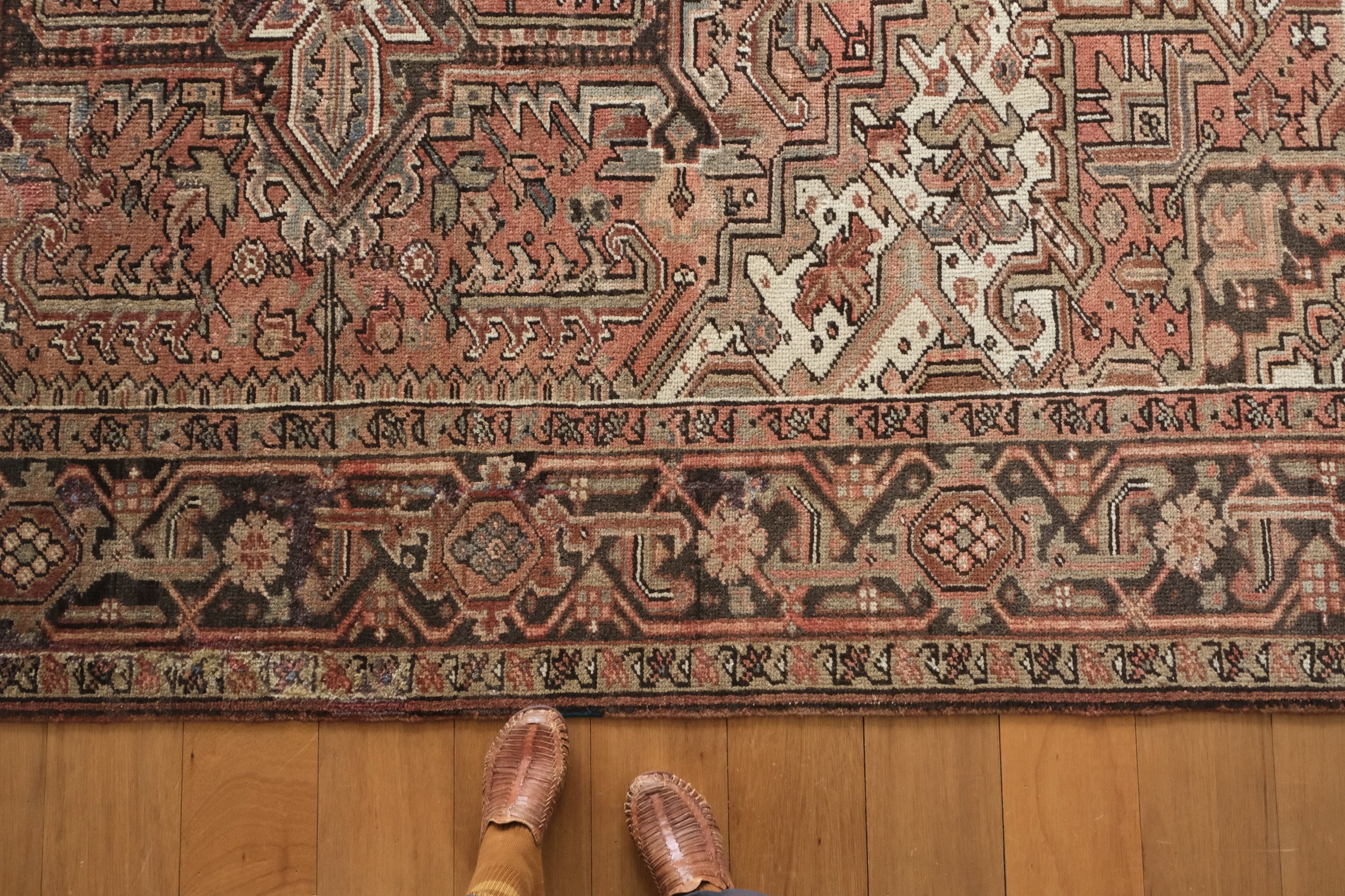 overhead photo of rug corner showing geometric design