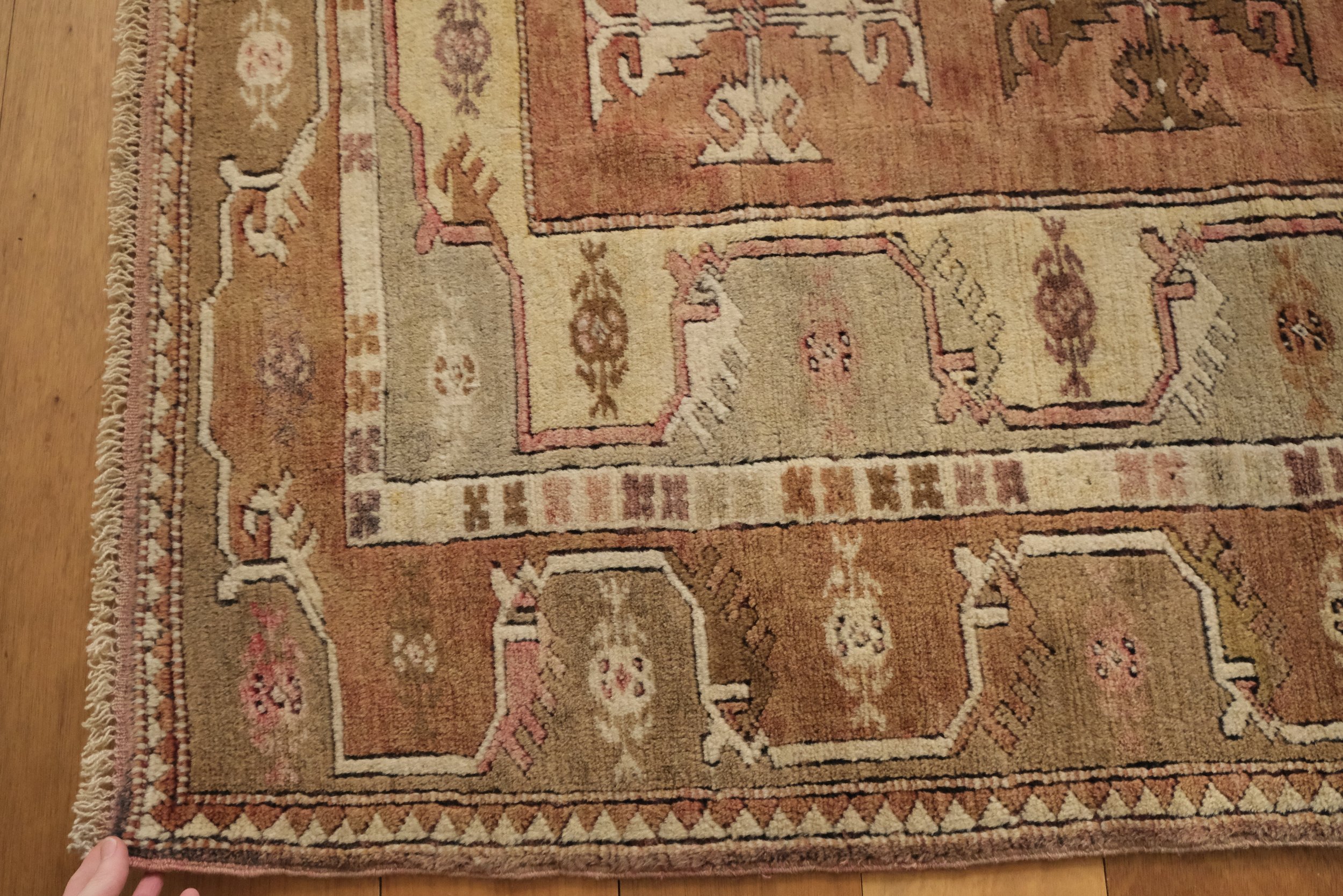 close-up view of corner of rug showing borders