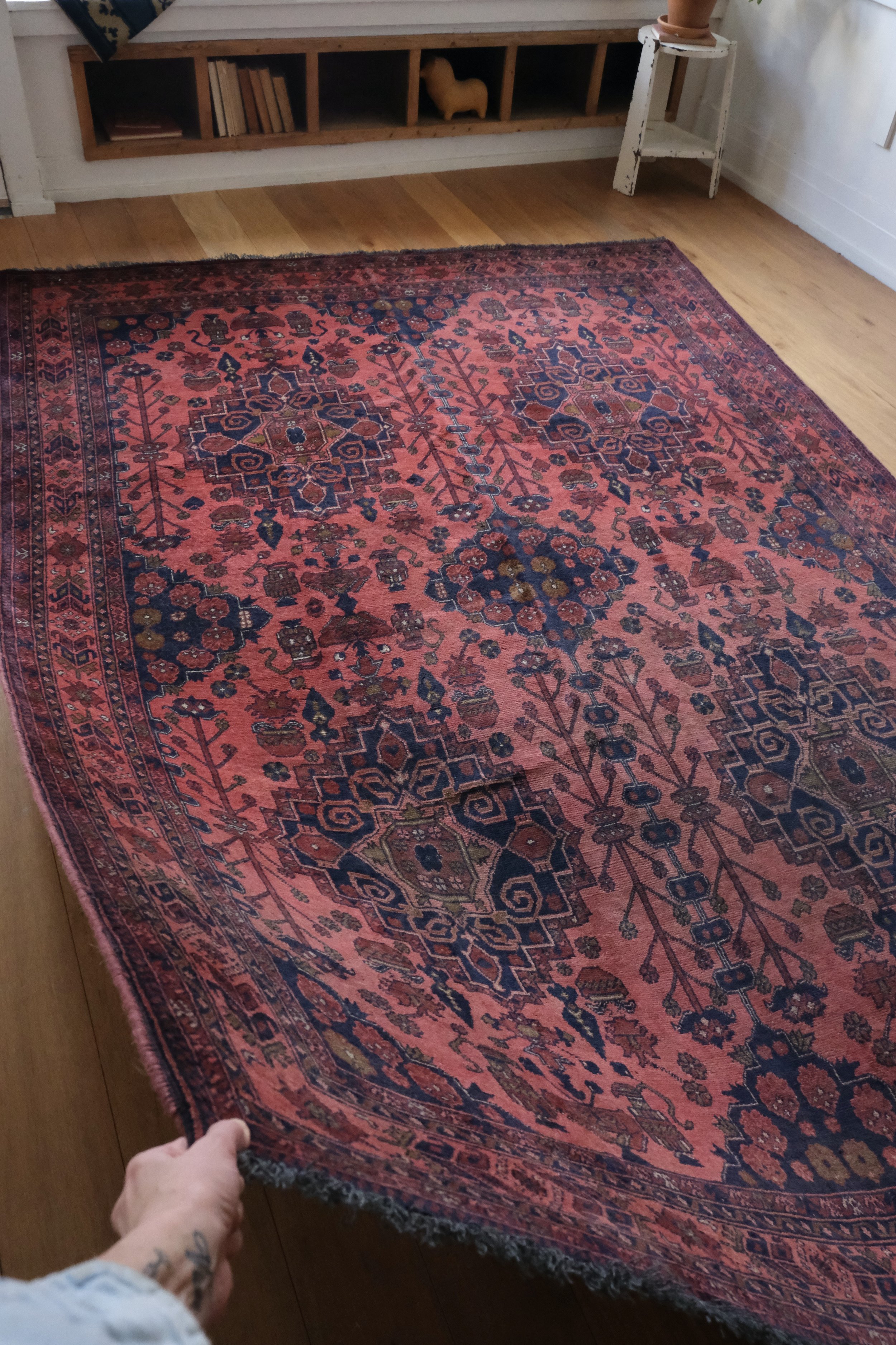 draped view of rug showing floppy handle