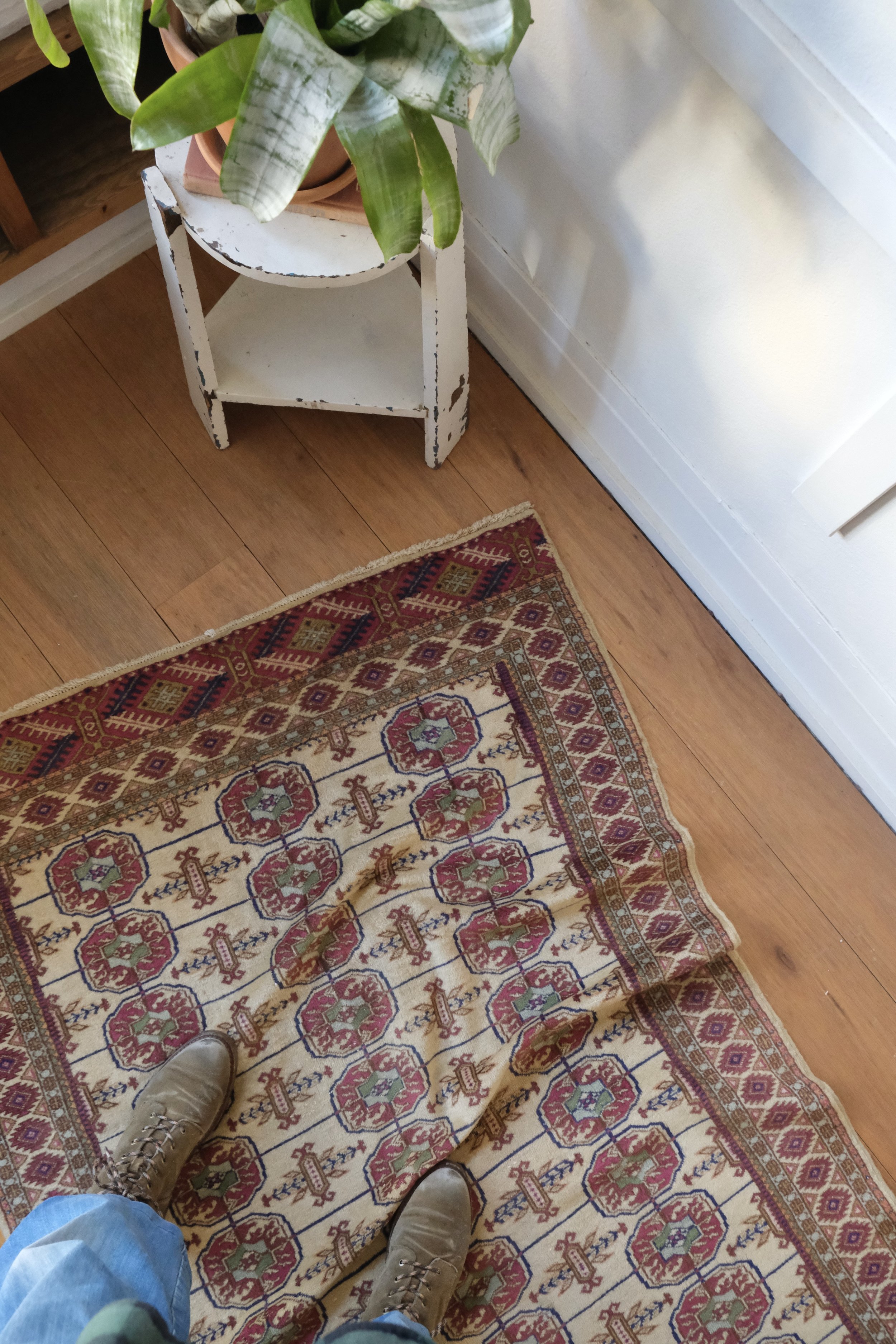 a close up of the rugs handle it is soft and drapey