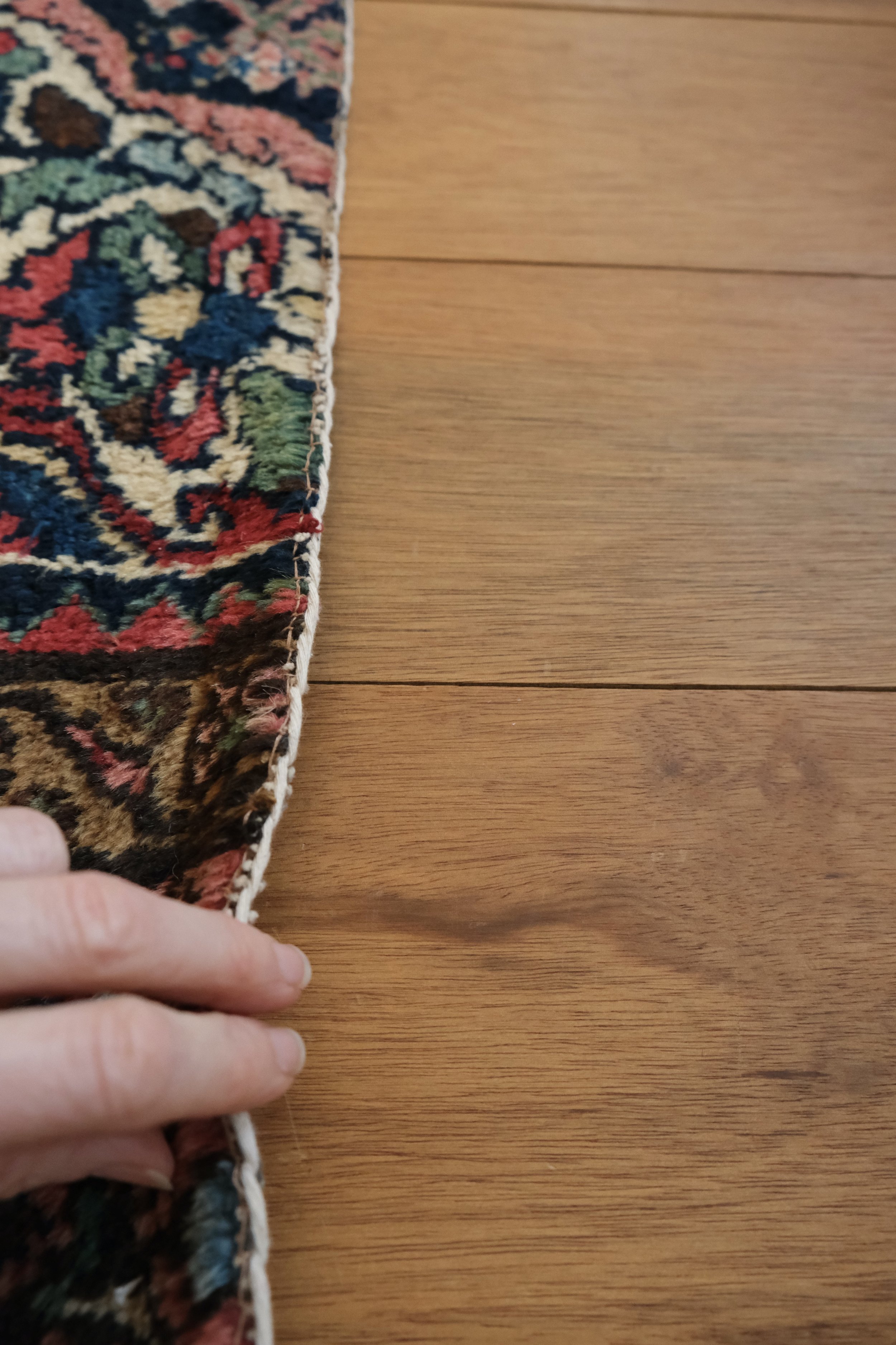 a peek at the over binding that finishes the rug