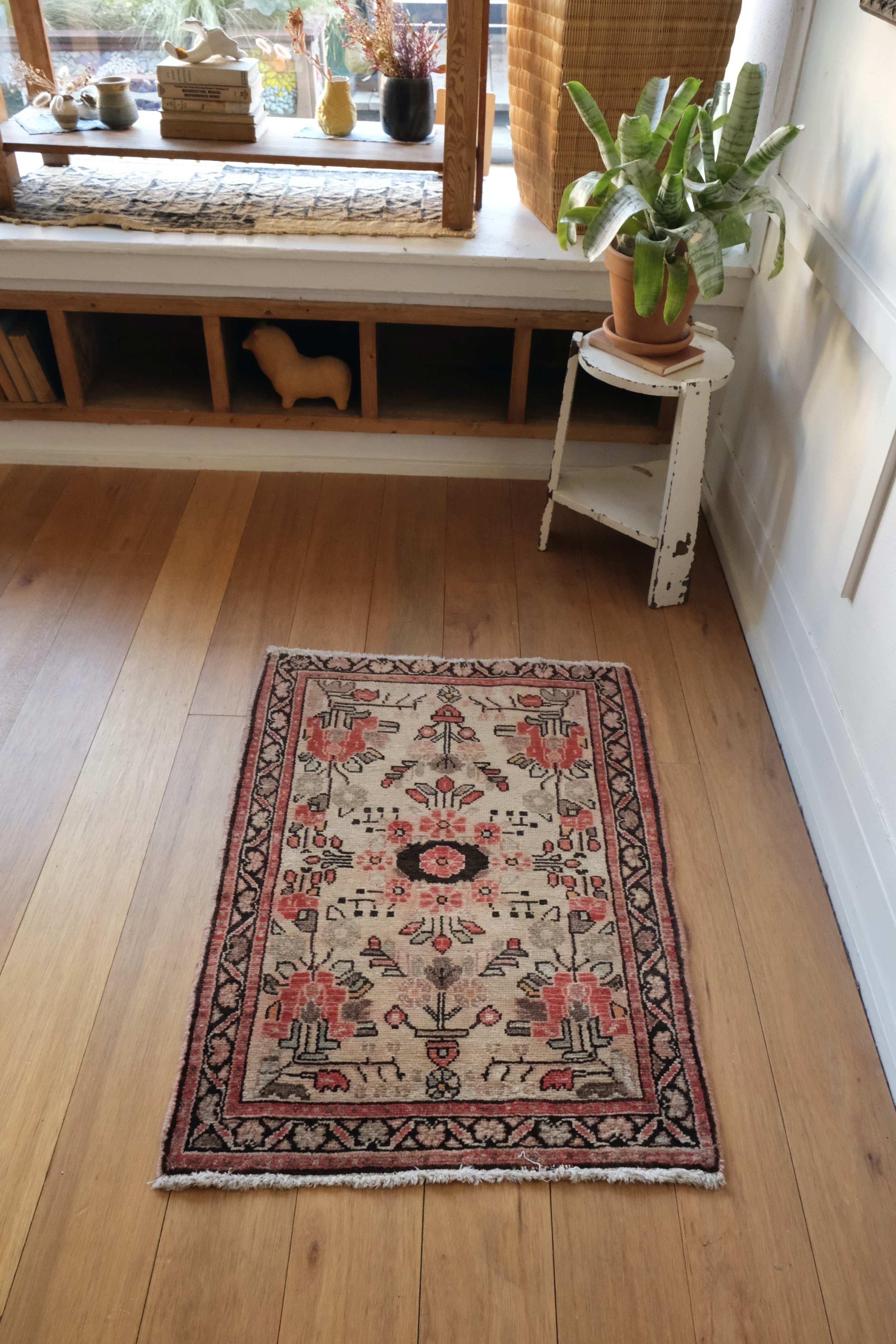 floral Turkish rug displayed lengthwise