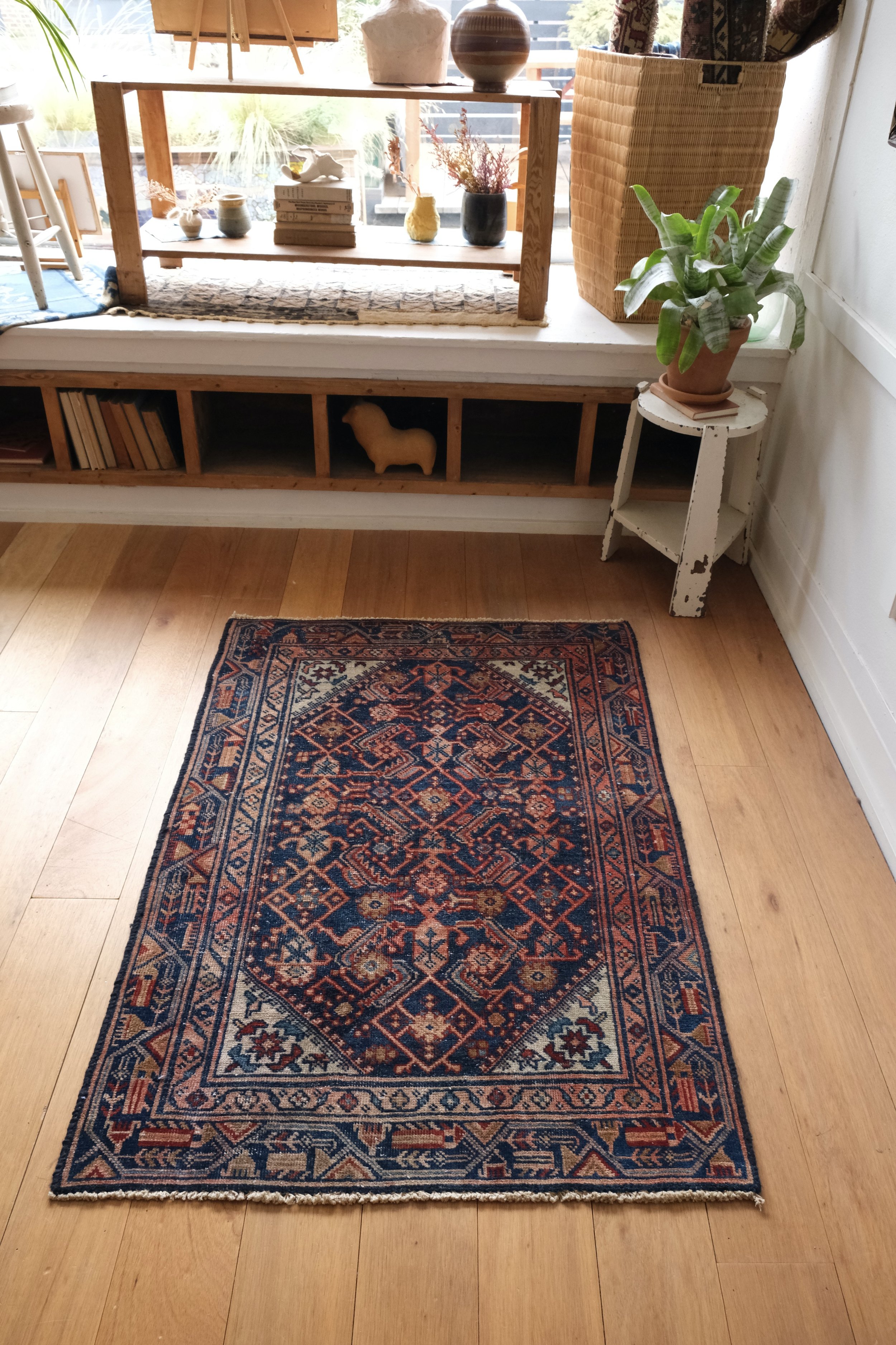 a full view of the persian rug in the studio