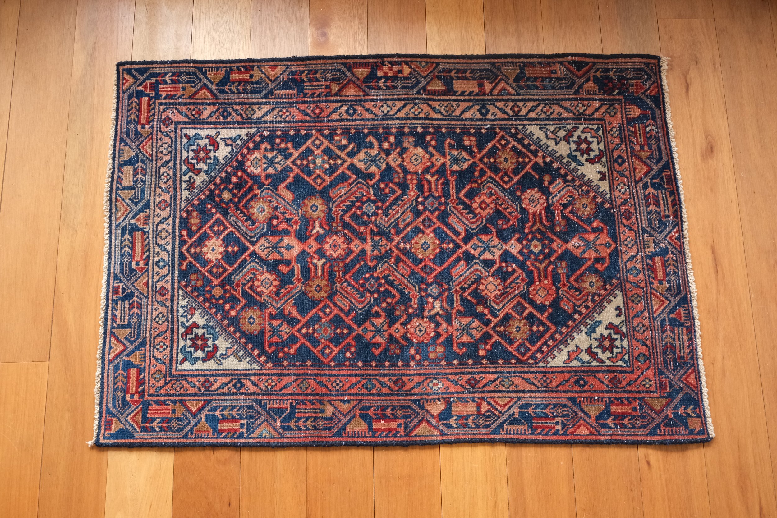 an overhead view shows the rug is rectangular