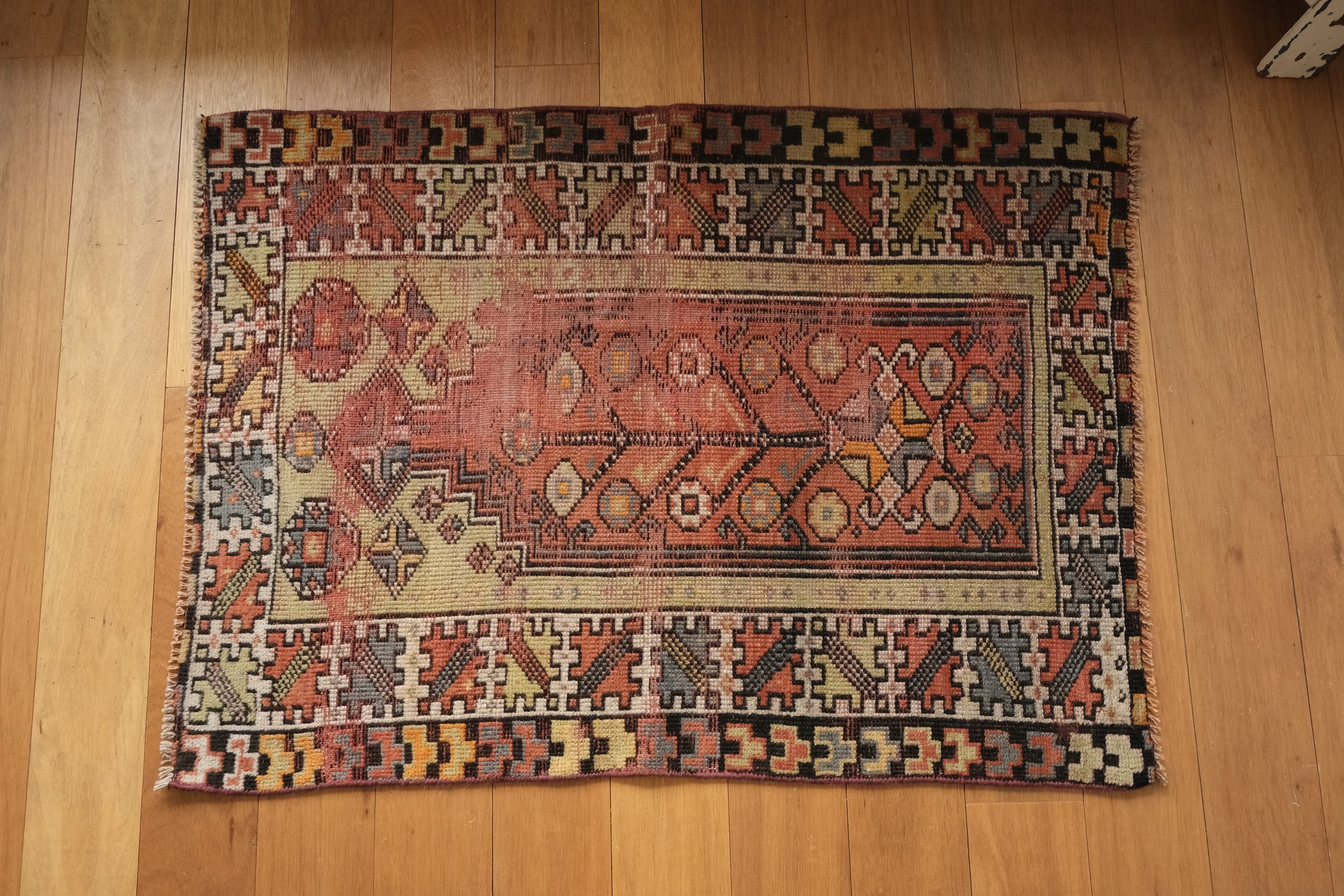 downshot of rug showing organic shape