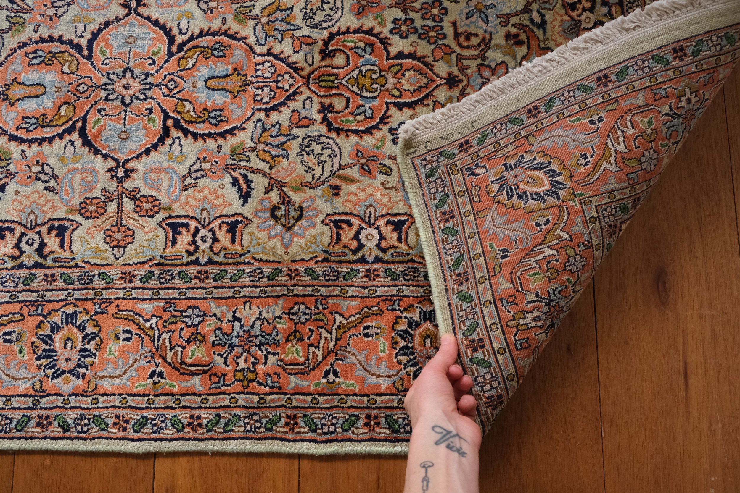 the backside shows its hand knotted qualities