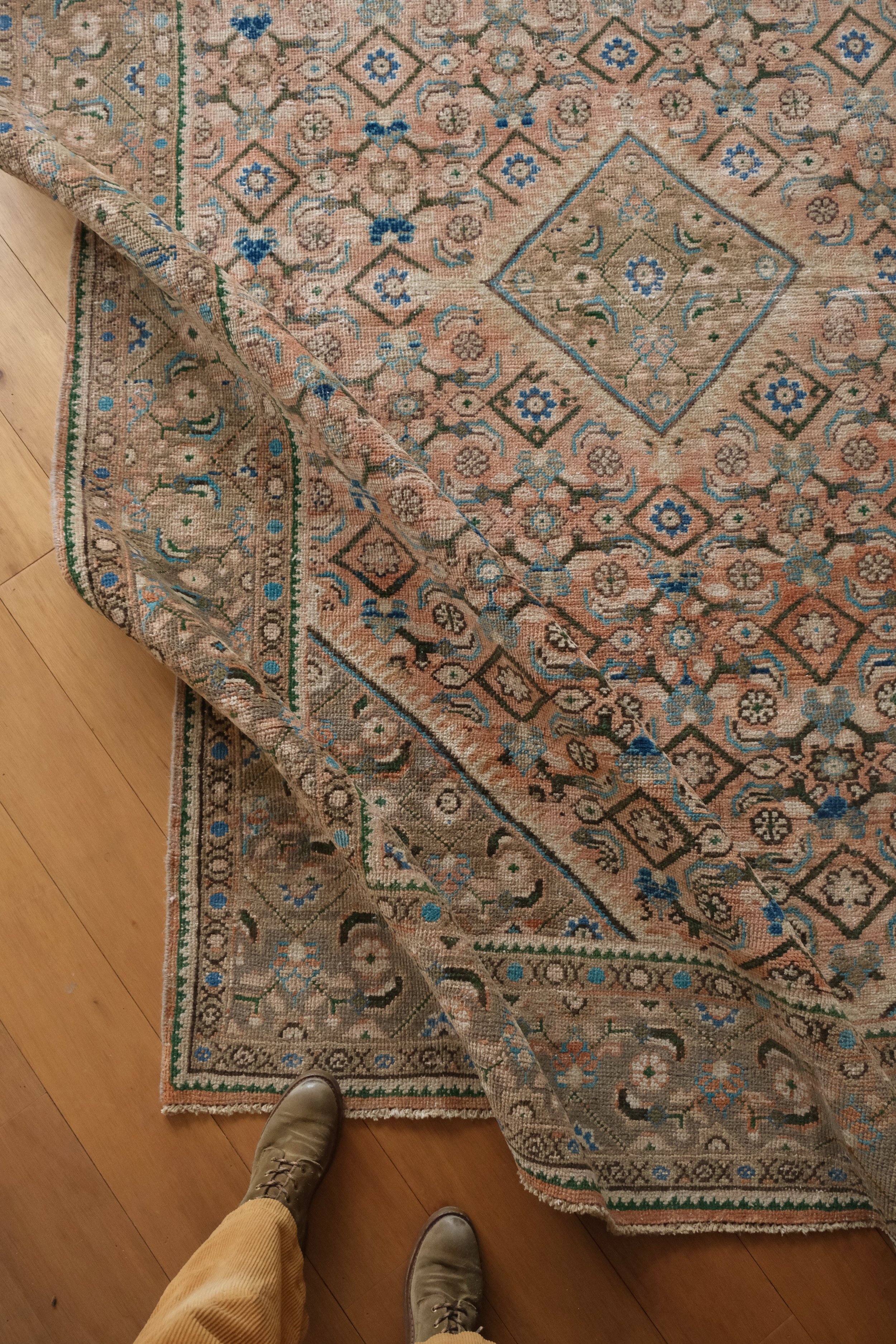 a photo of the drape of the vintage persian mahal rug