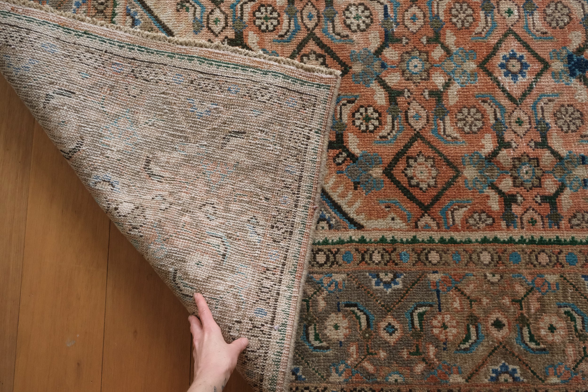 the back side shows its hand knotted qualities