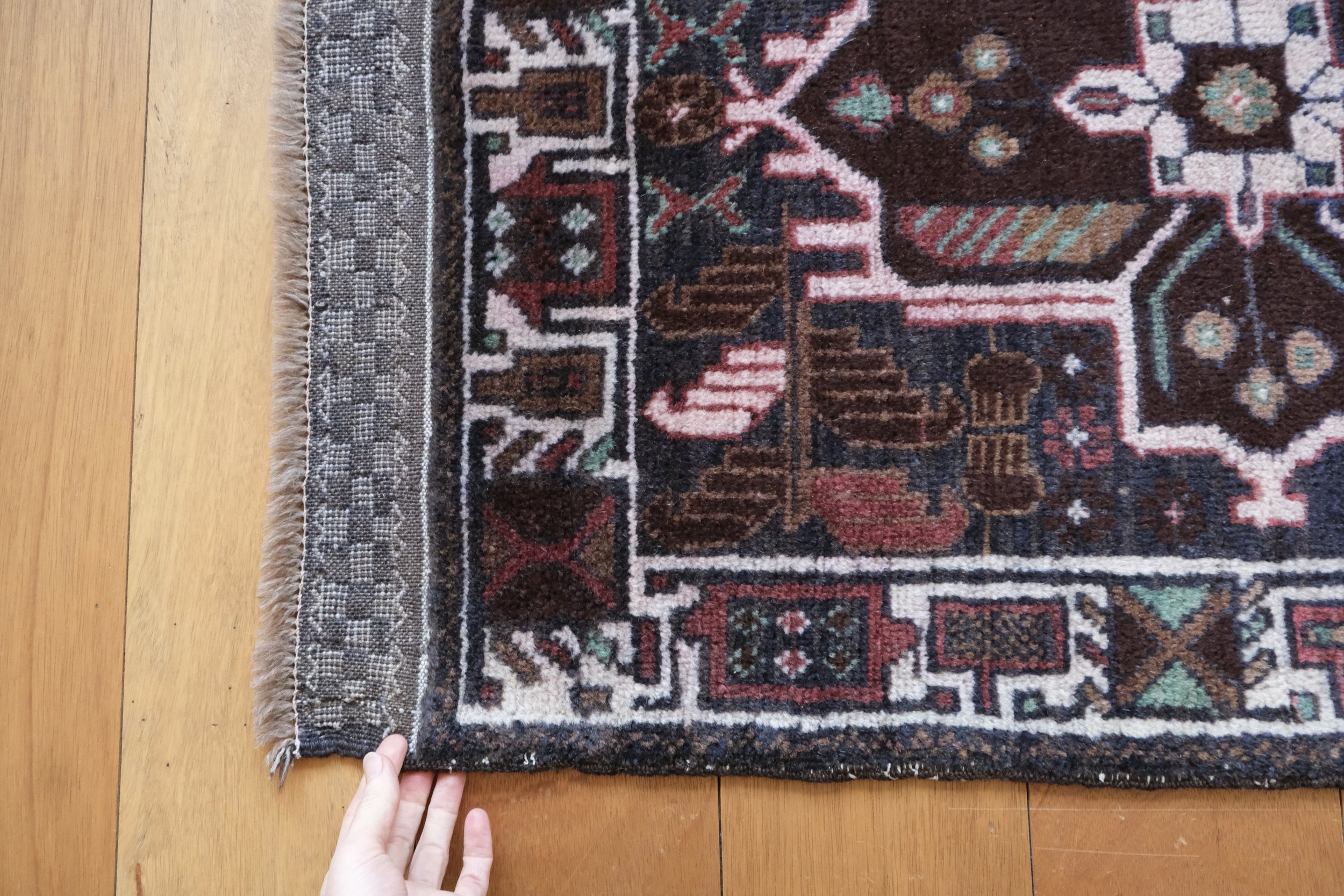 the shoulder of the rug