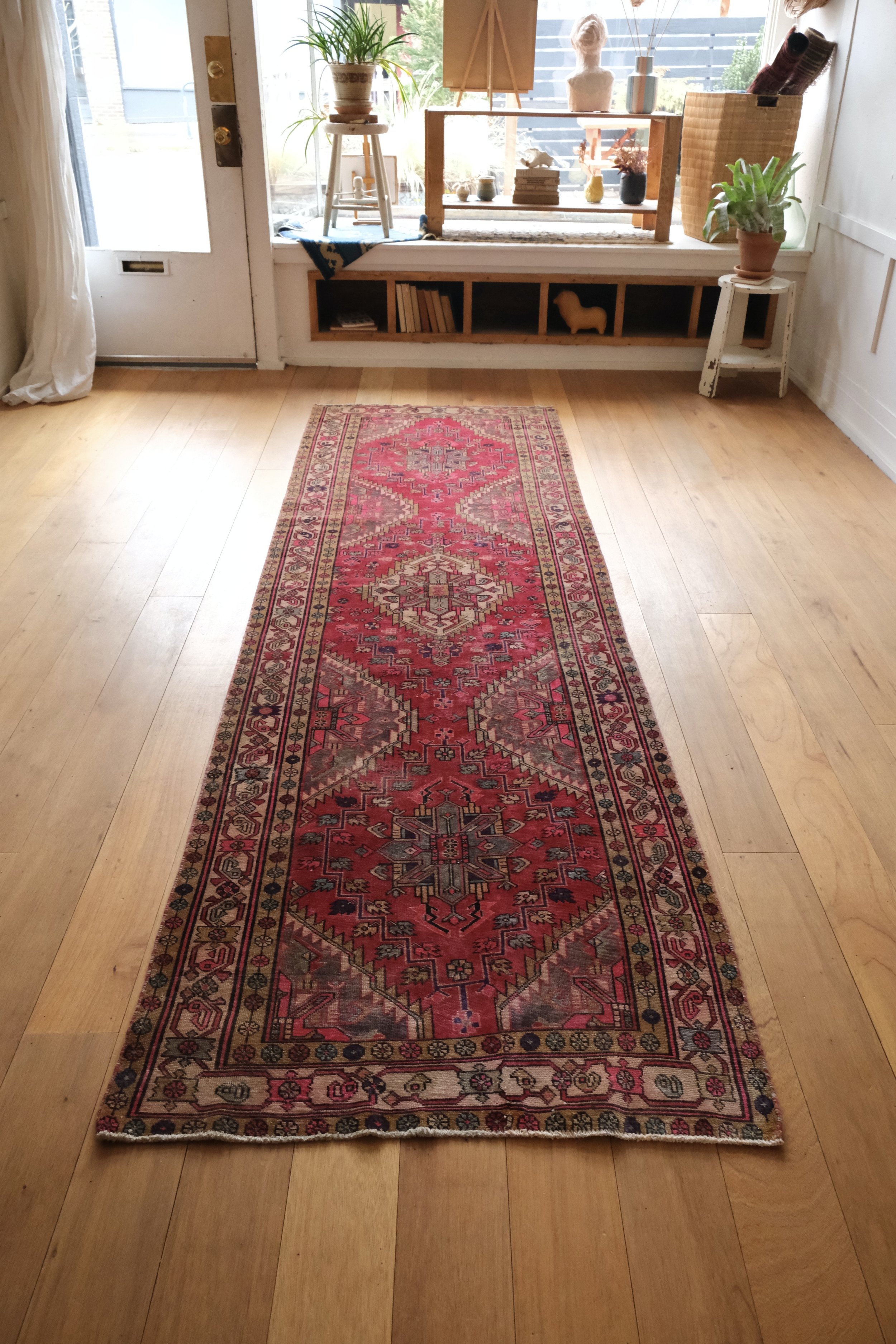 the candy apple reds on the runner rug pop