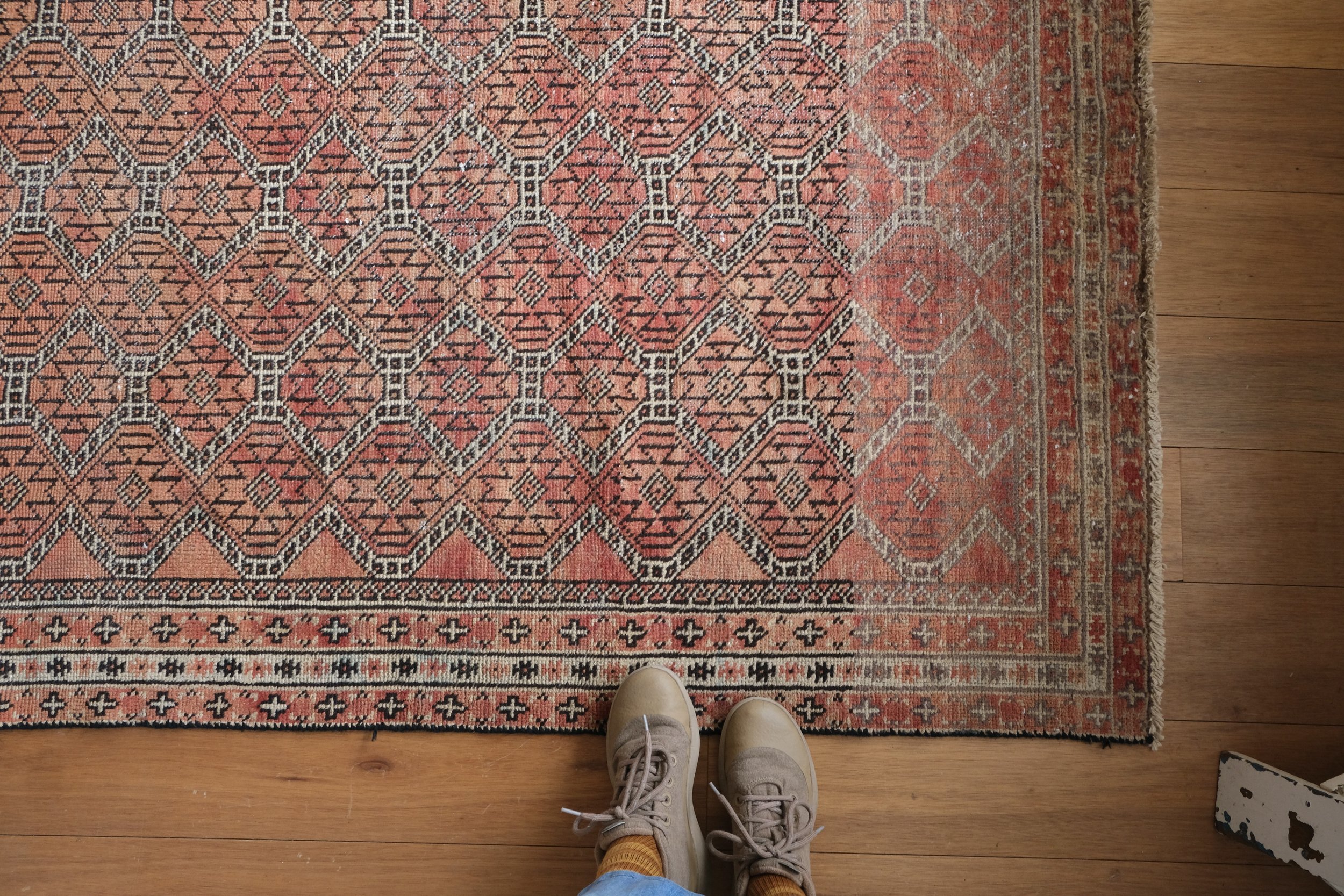 corner of rug showing ombre fade