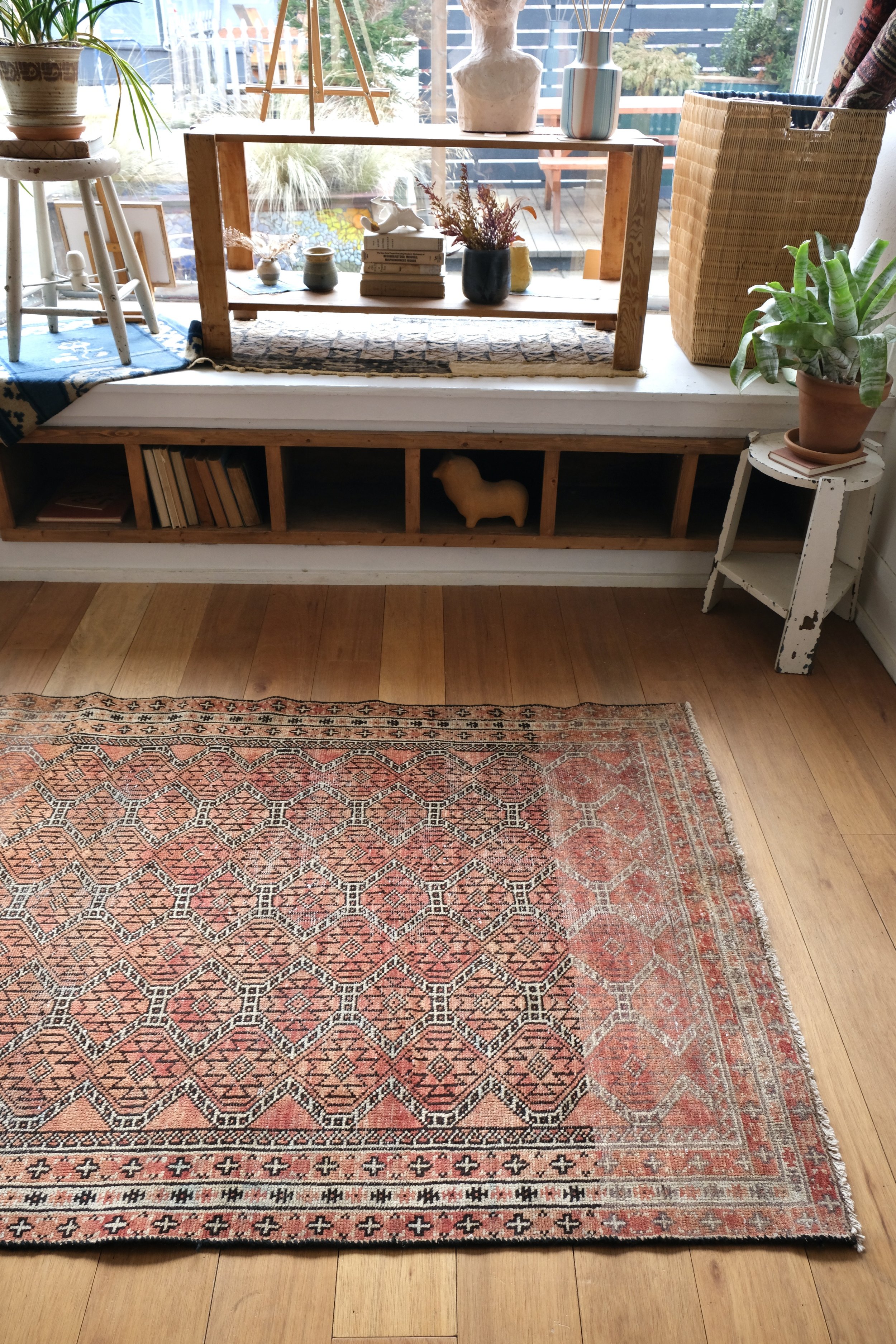 rug styled with plants