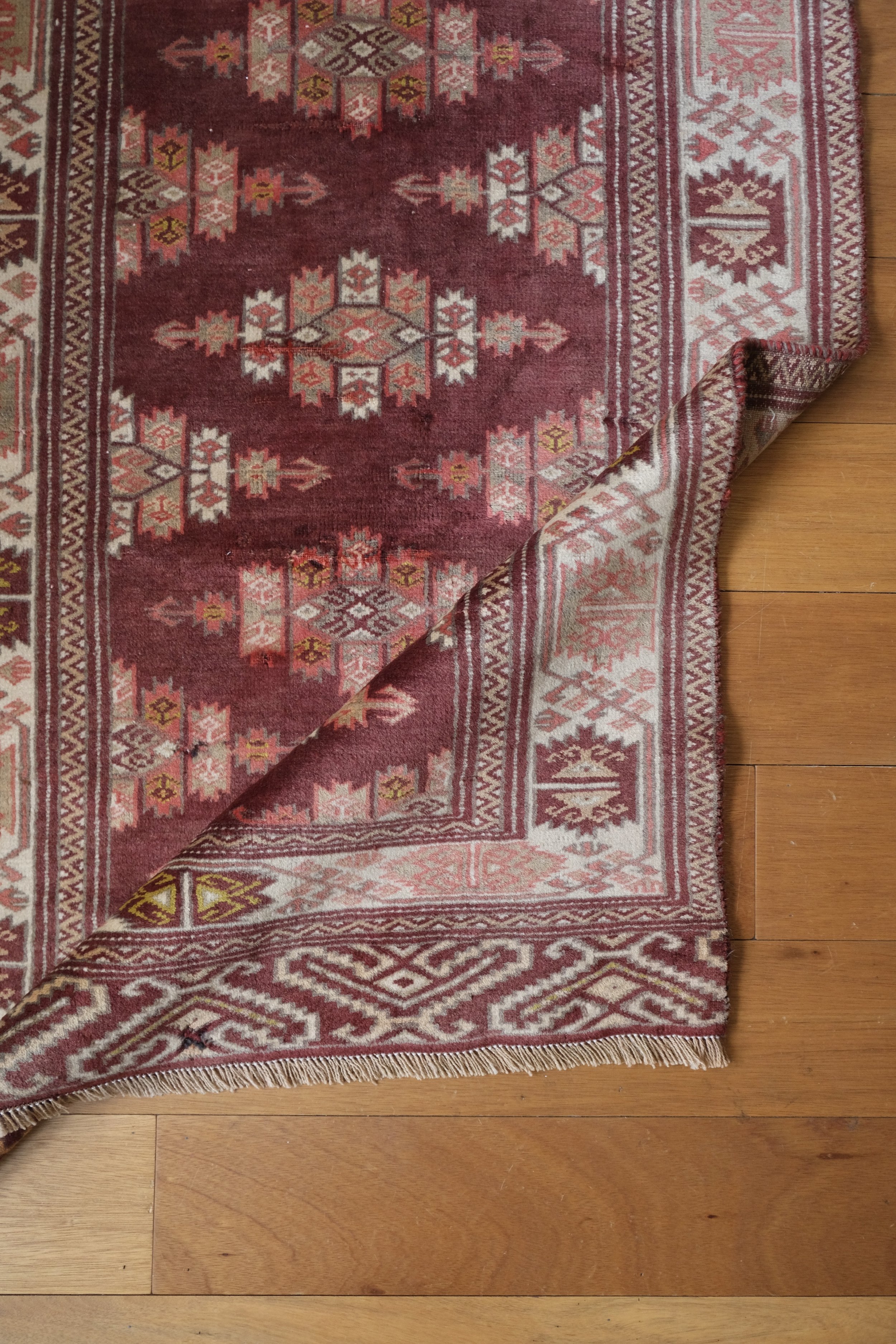 rug shown folded to display floppy handle